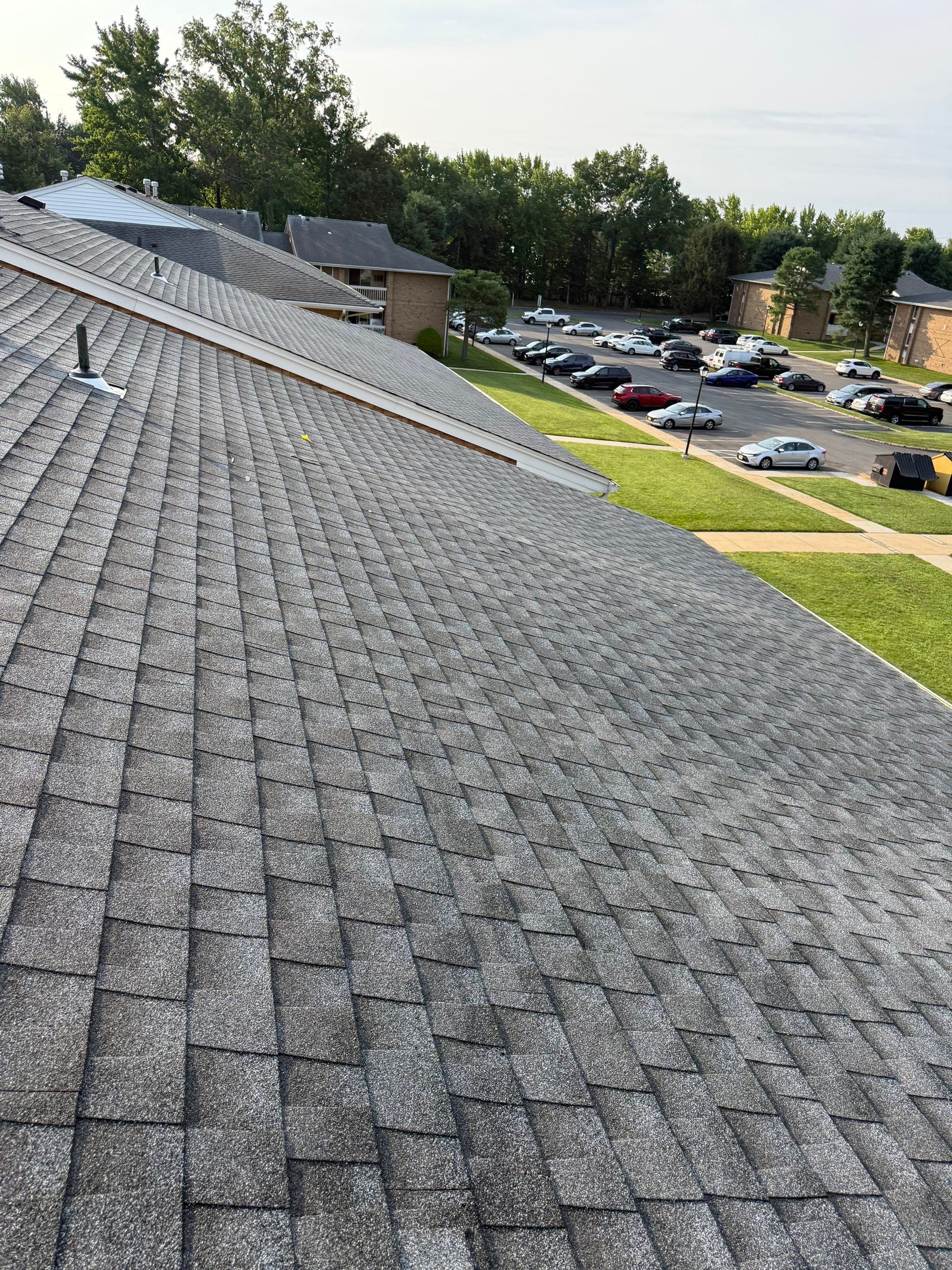 Apartment Complex Roof Replacement and Decking Repair in North Brunswick by JVW ROOFING