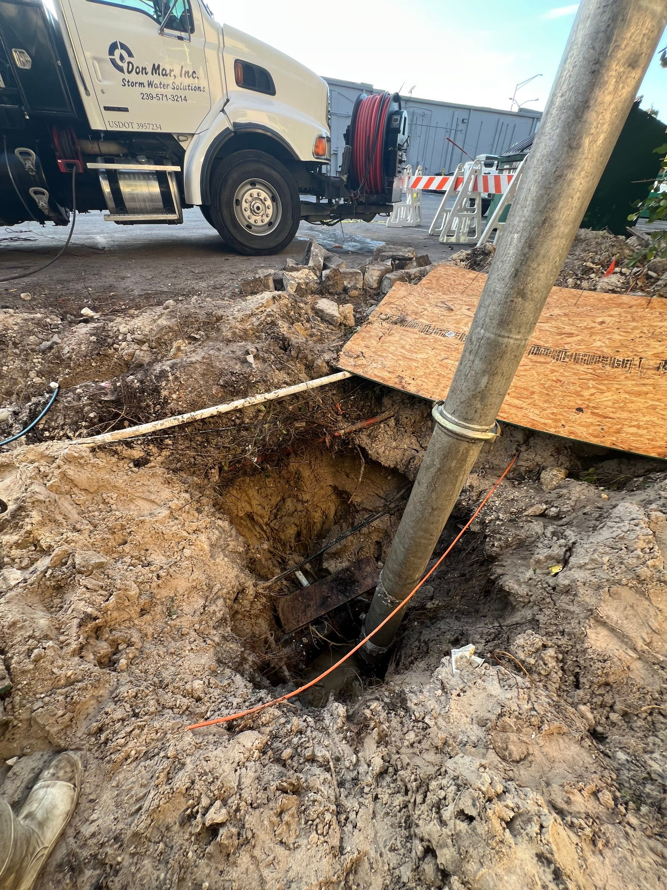 Hydro Excavating a Water Main for Repair by Don Mar, Inc. Storm Water Solutions