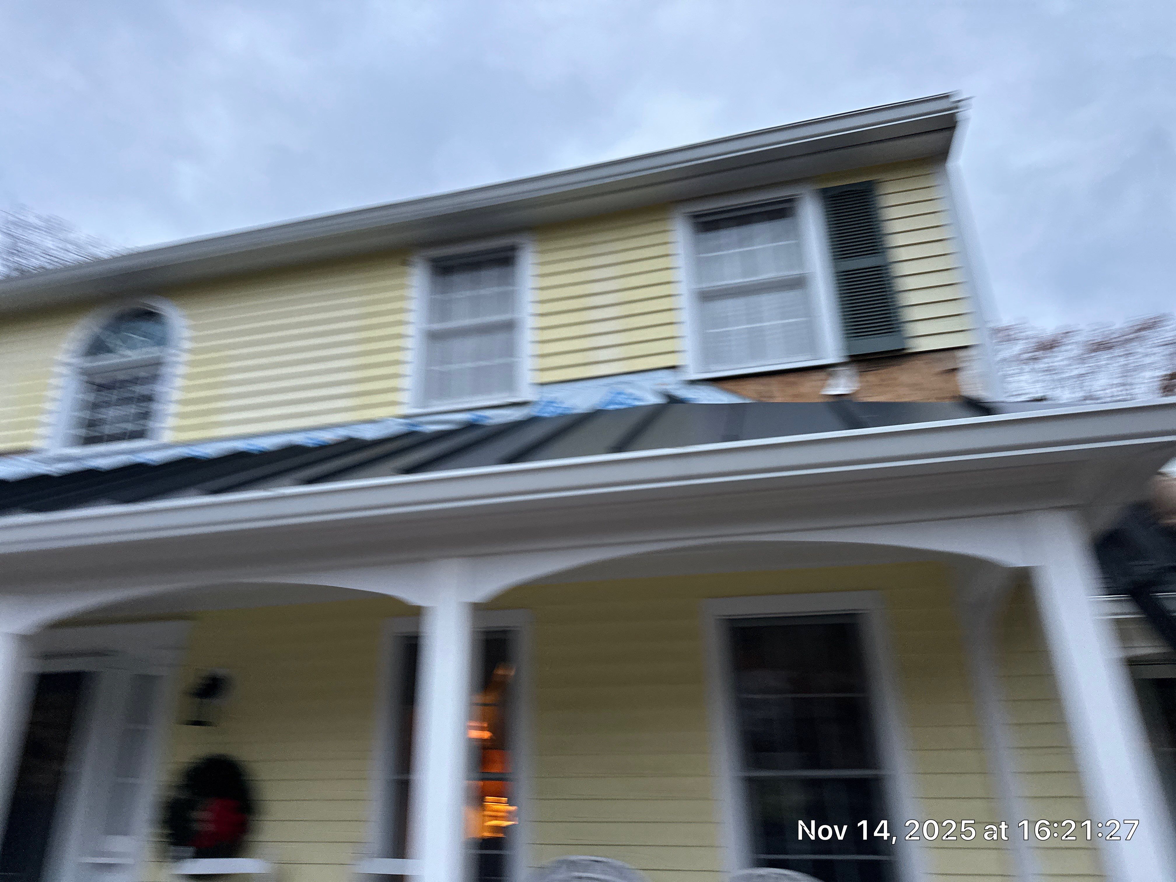 Chelmsford Premium Roof: Onyx Black Shingles with Standing Seam Metal Porch by Mighty Dog Roofing of Greater Middlesex County