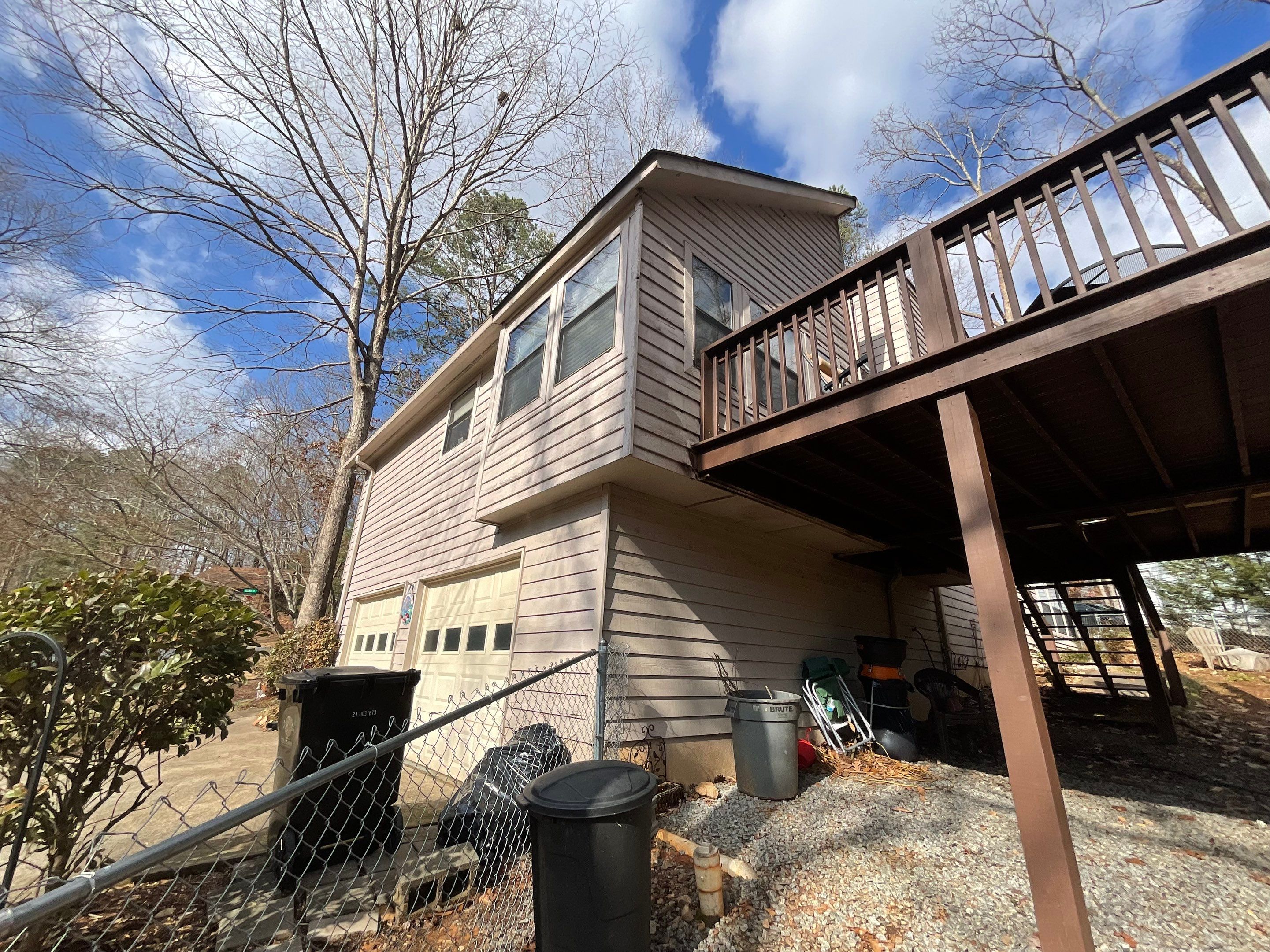 Exterior Painting and Deck Refinishing for an Acworth Residence by Swift Home Renovations
