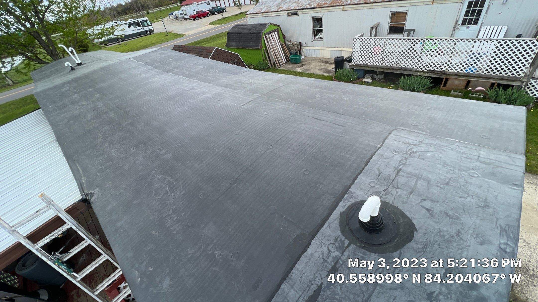 Residential Roofing Installation using 60 mil rubber roof  by Nitro Roofing and Construction