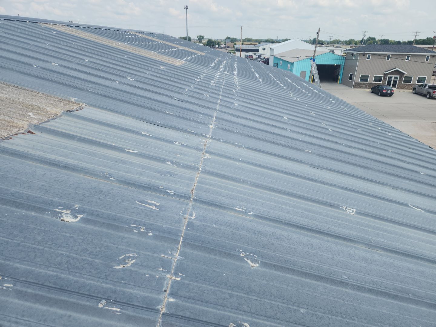 Metal Roof Restoration - Columbus, NE by Tillotson Enterprises