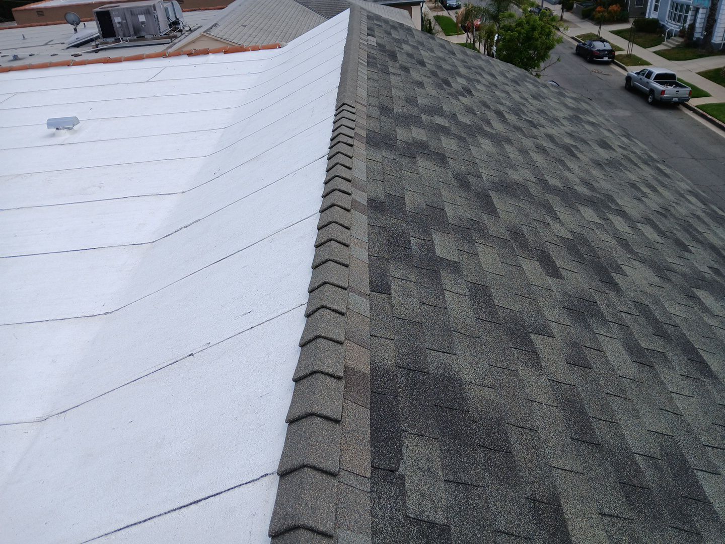 Apartment Building Reroofing using Polyfresko® G Highly Reflective Modified Bitumen Cap Sheet by Hull Brothers Roofing