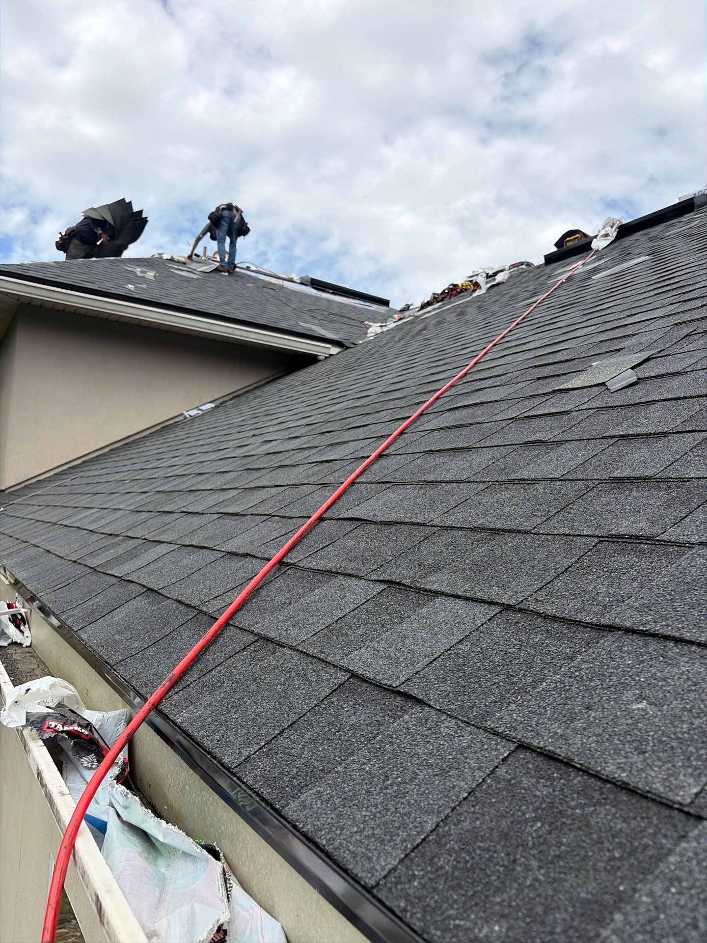 Architectural Shingle Roof Replacement and Skylight Integration in Jacksonville by Miller Roofing Solutions LLC.