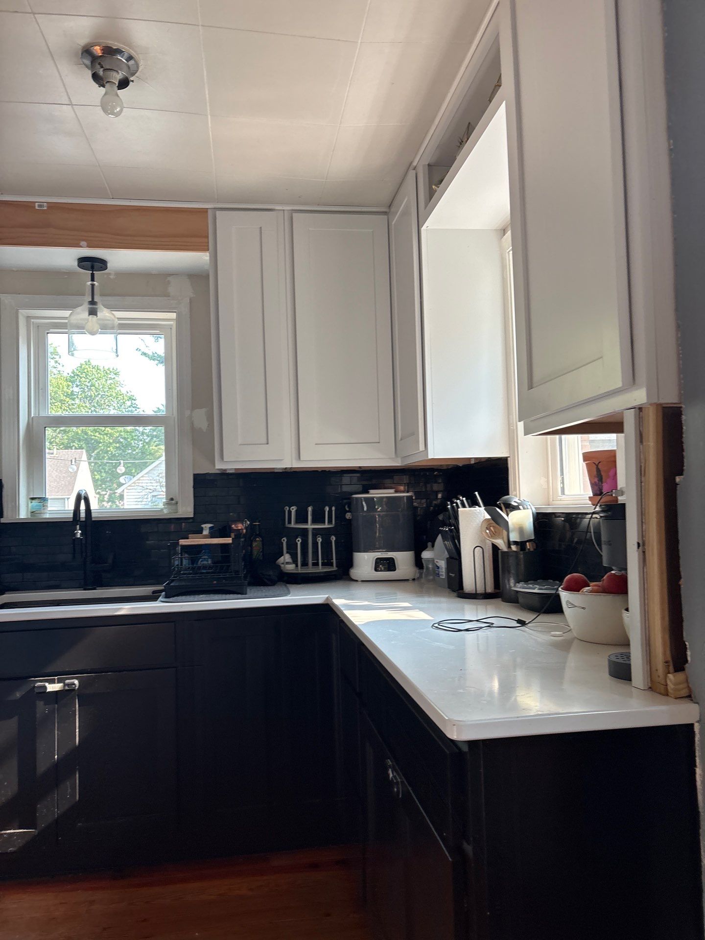 Lincoln Kitchen Remodel With Black and White Two-Tone Cabinetry by CompanyCam Sales Demo