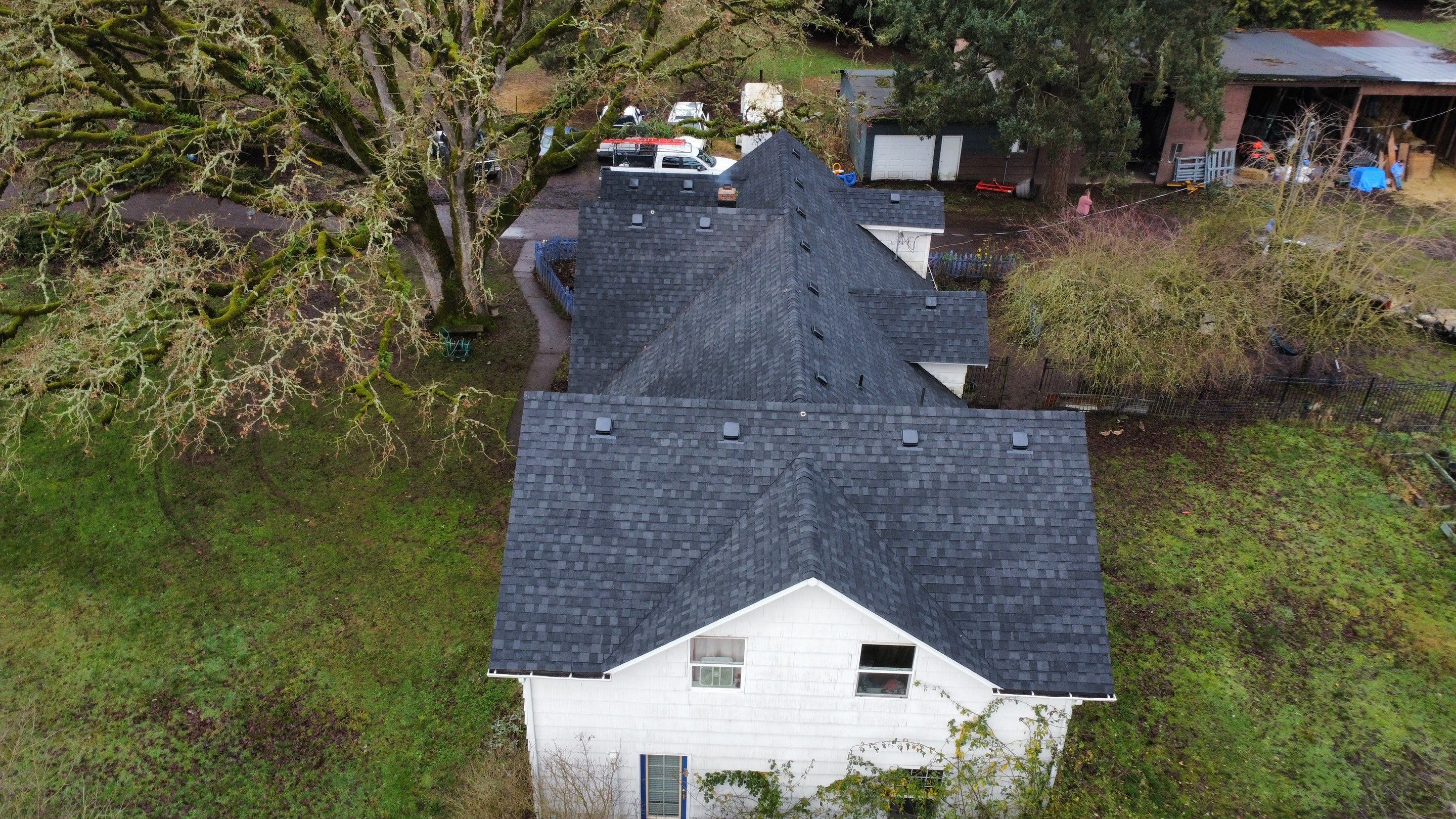 Residential Roofing Installation using IKO Dynasty (Color: Granite Black) by Orezona Building & Roofing Company, Inc.