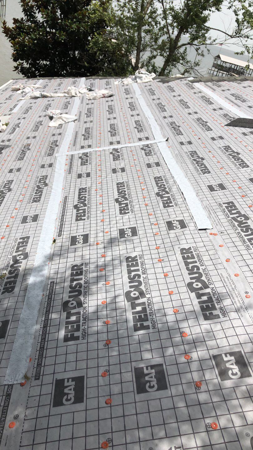 Residential Roofing Installation using Roof Replacement by American Roofing & Construction LLC