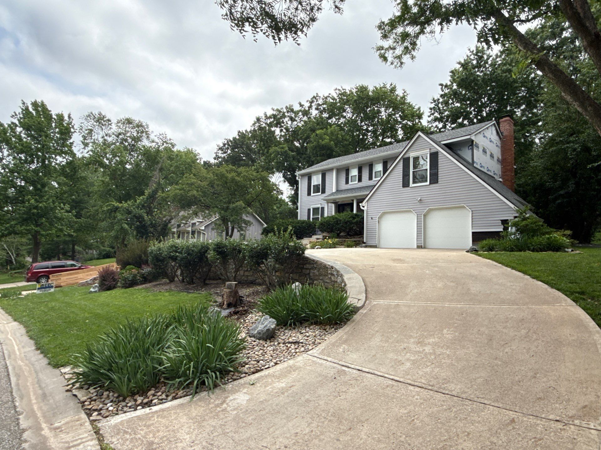 Full Exterior Siding Upgrade and Board and Batten Installation in Shawnee by EEC Windows, Siding & Roofing