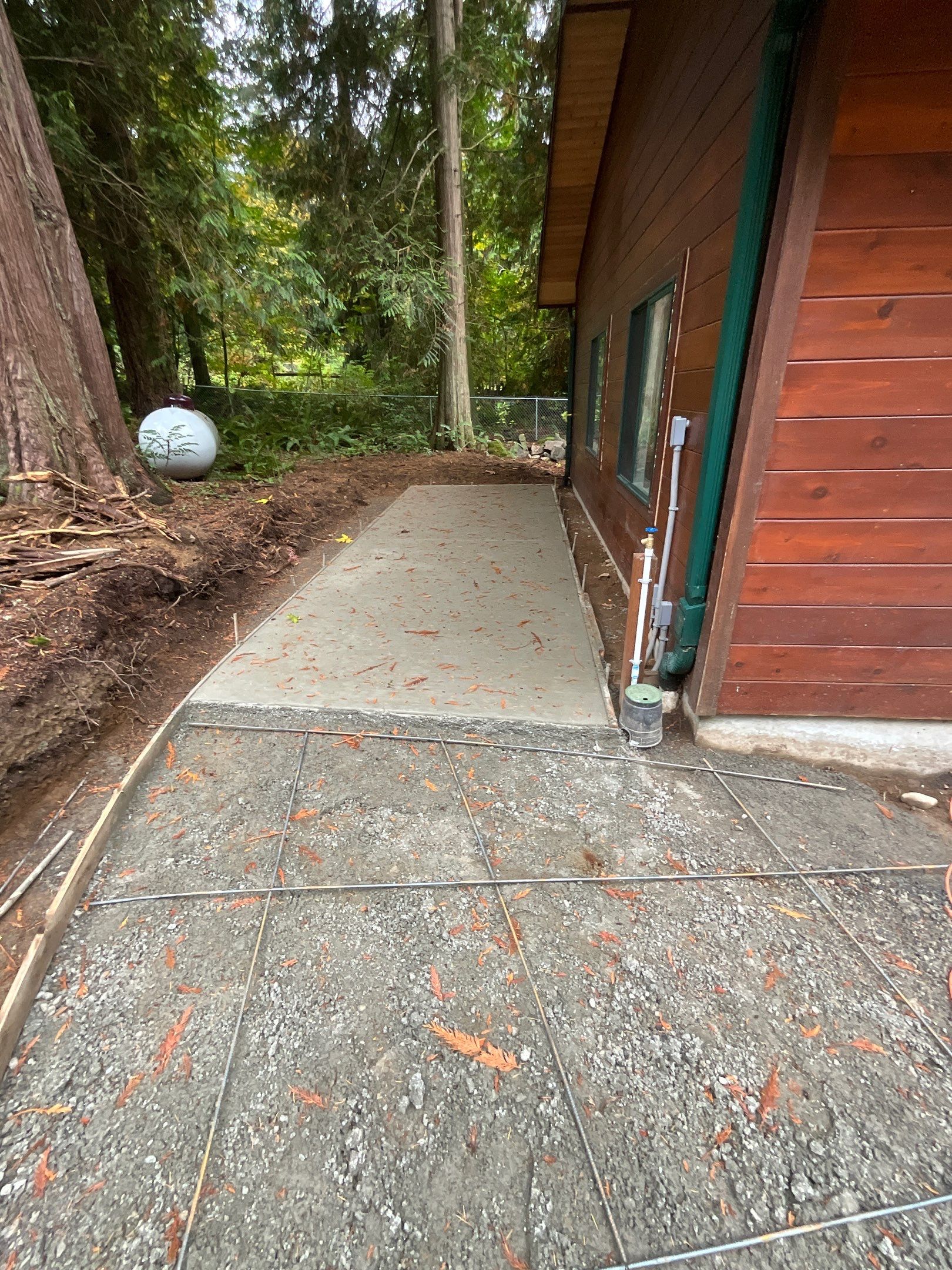 Pia | Custom Concrete Driveway, Walkway & Floating Steps by Jireh Asphalt & Concrete Inc 