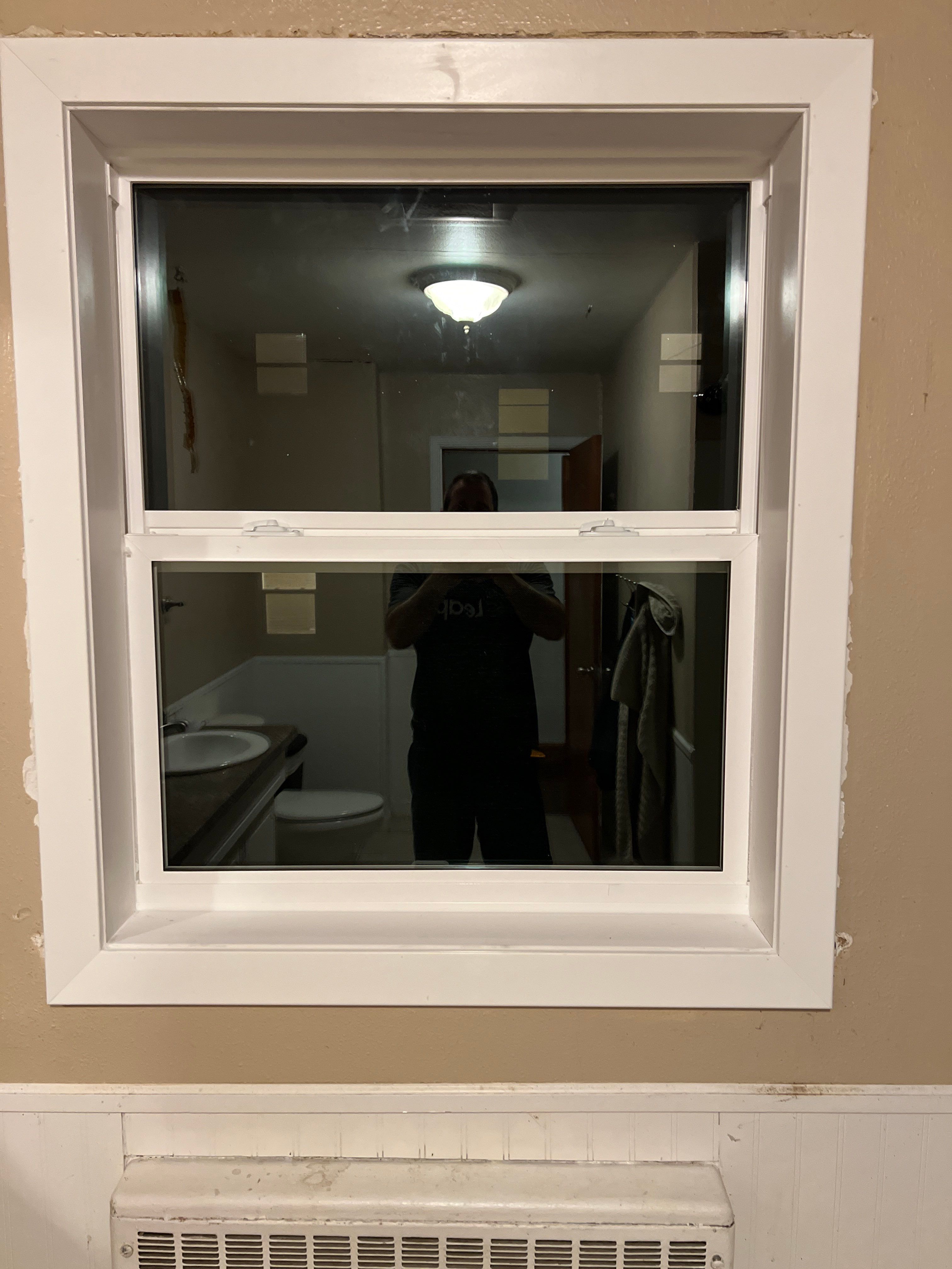 Pella Window installation using Pella 250 series vinyl window by United Windows and Siding LLC