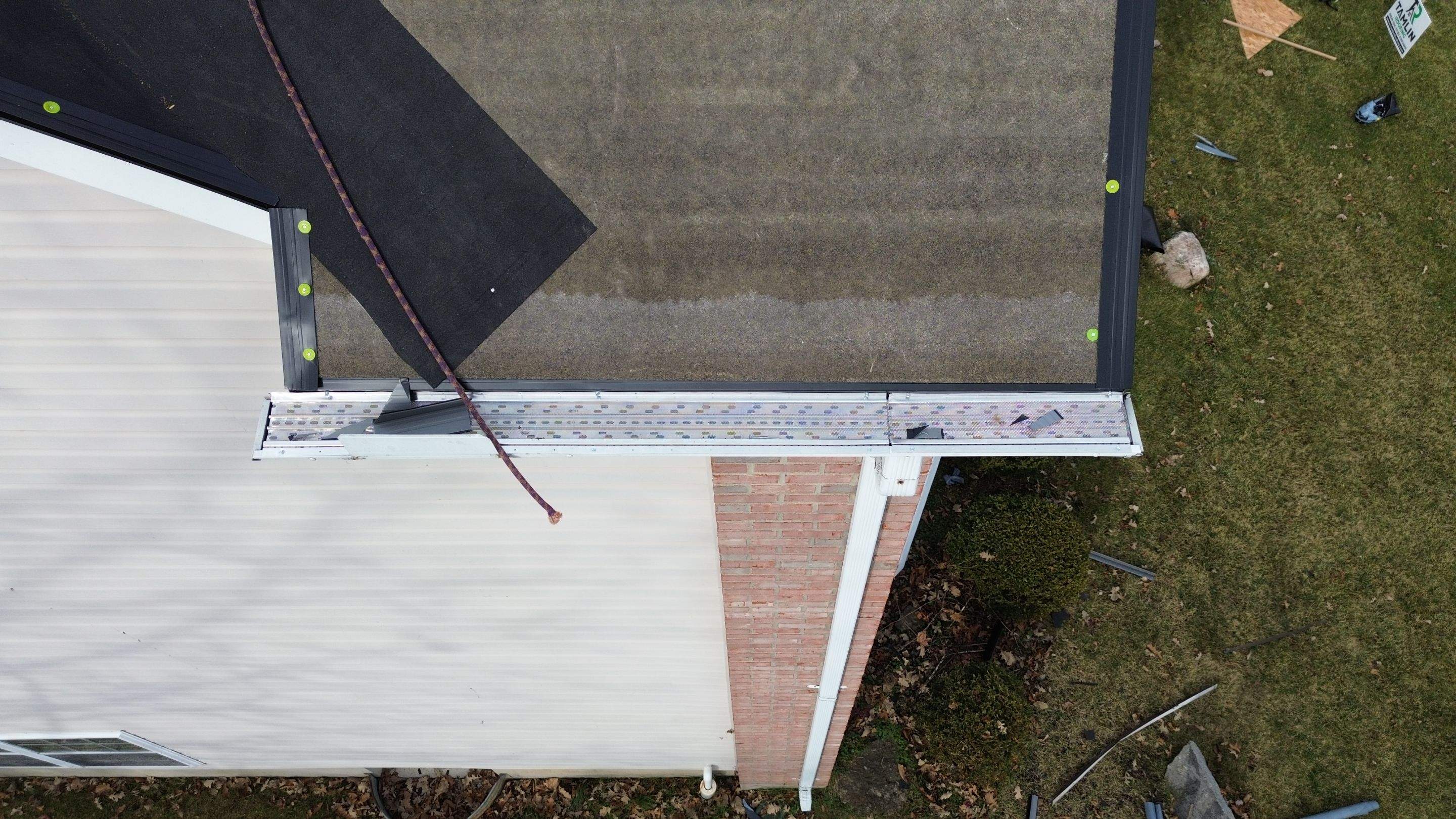 Walden Ponds - Pristine Black and Hydro Flo Gutter Guards by Tamlin Roofing