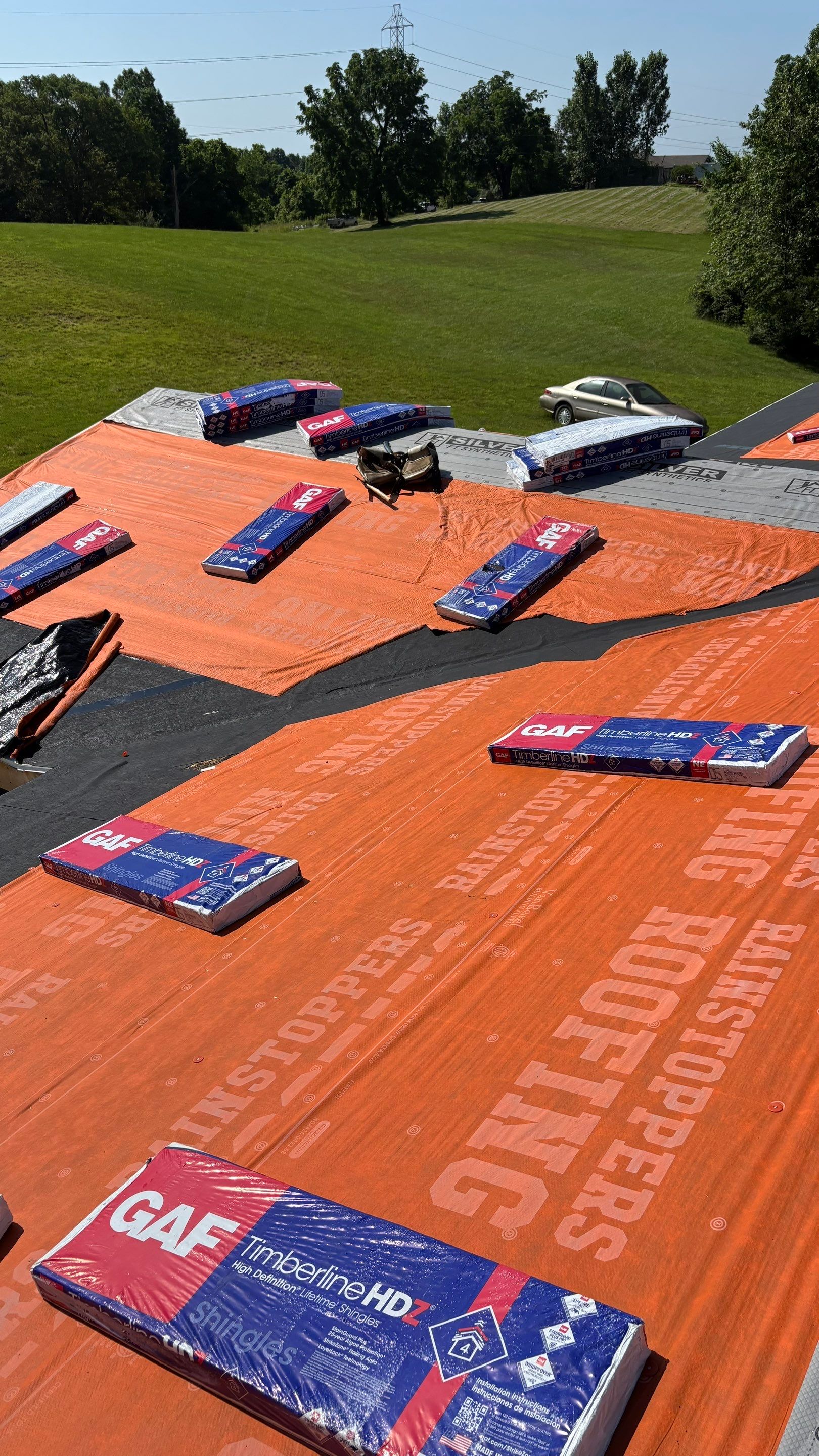 Residential Roofing Installation using GAF Timberline HDZ Barkwood by Rainstoppers Roofing