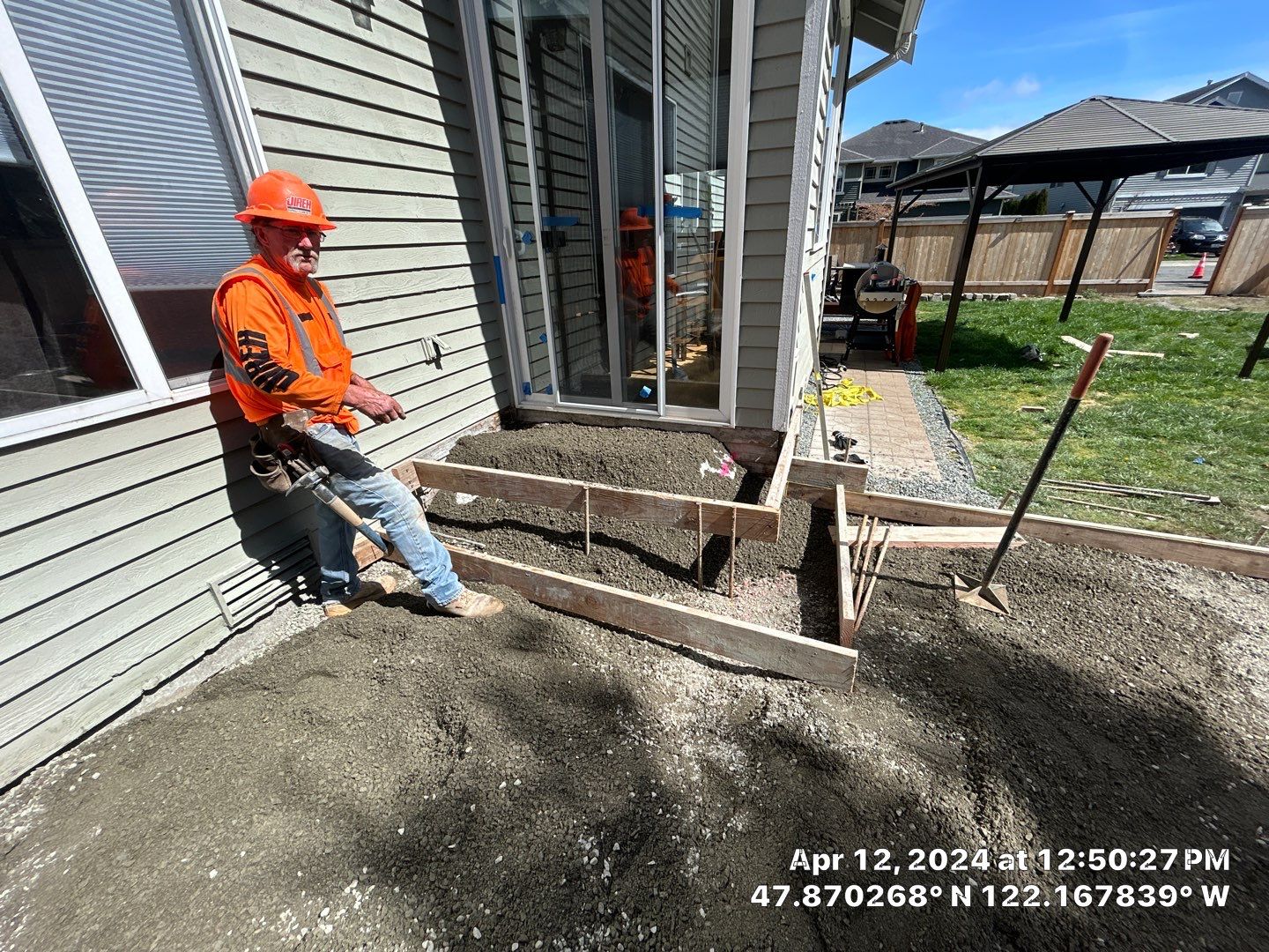 Benedict | Stamped Concrete Back Patio by Jireh Asphalt & Concrete Inc 