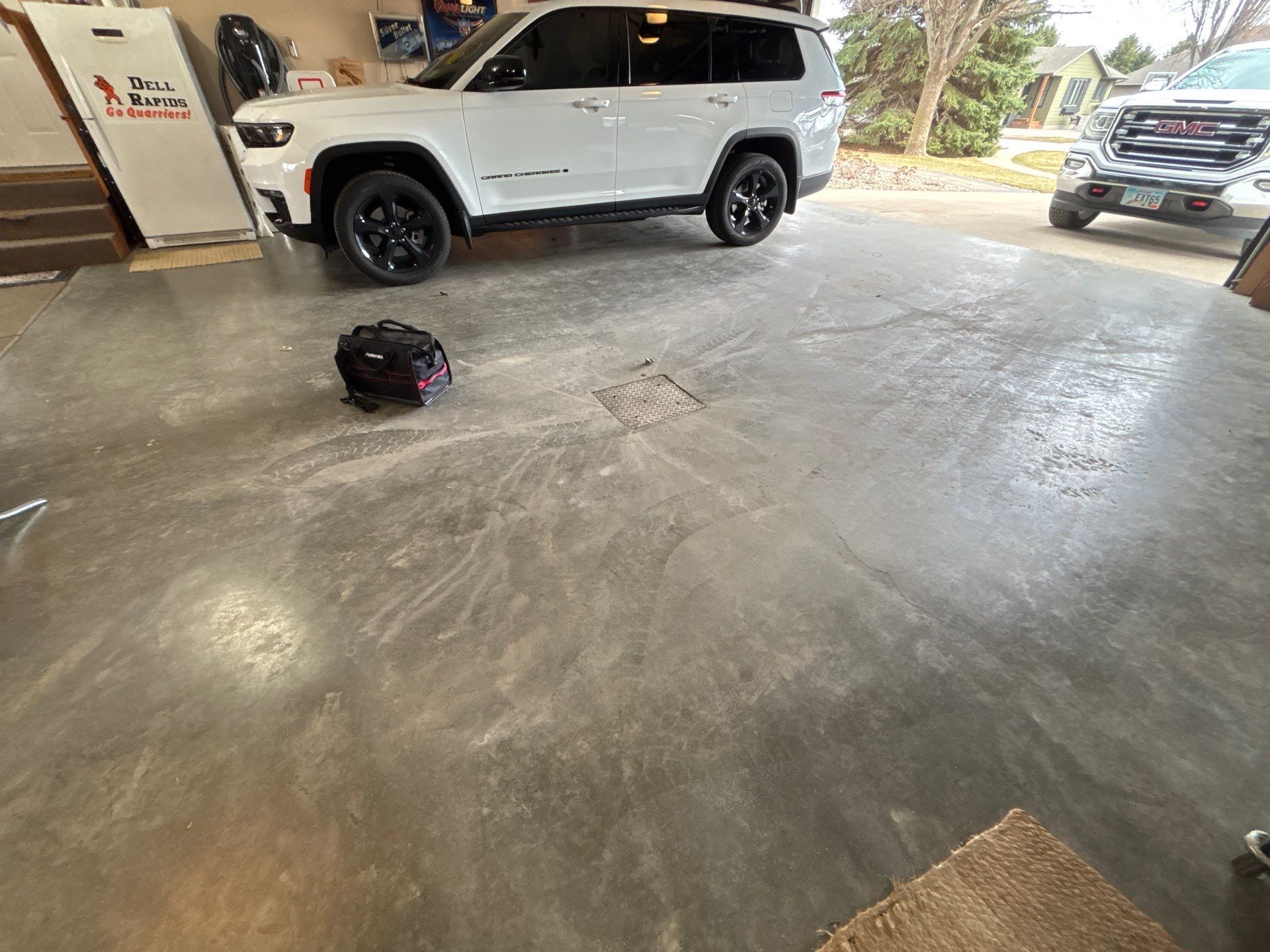Multi-Fleck Epoxy Garage Floor Coating in Dell Rapids by Select Painting, Coatings & Garage Cabinets