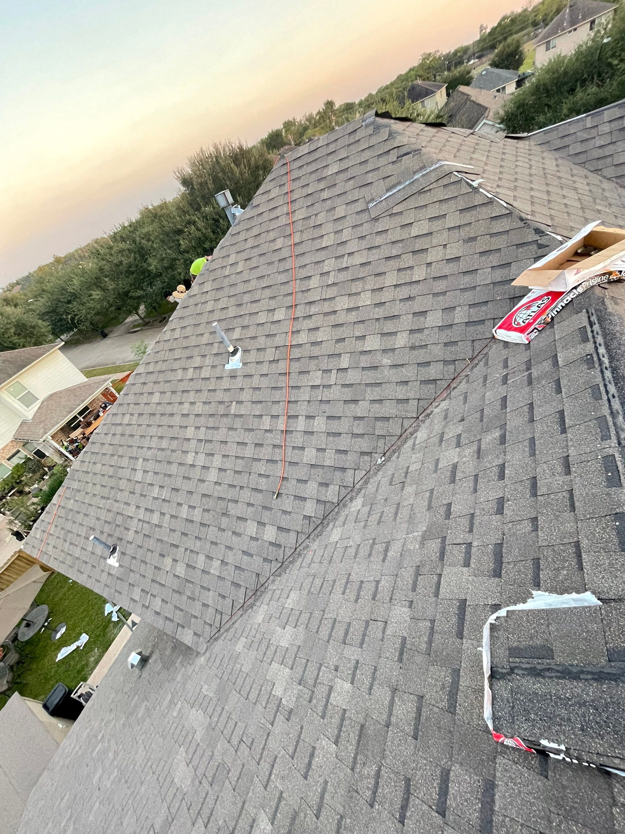 Residential Roofing Installation using Atlas Pinnacle® Pristine Shingles Weatherwood Color by CAP Roofing and Construction LLC