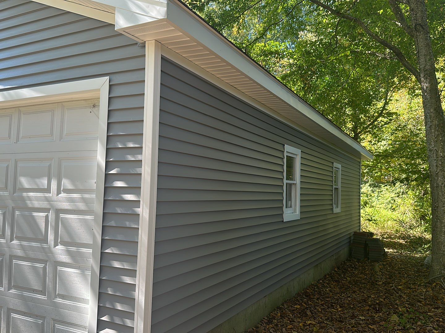 Residential Roofing Installation using Owens Corning TruDefinition Duration AR - Onyx Black & New Siding Using Mainstreet Charcoal Gray by A Plus Exterior