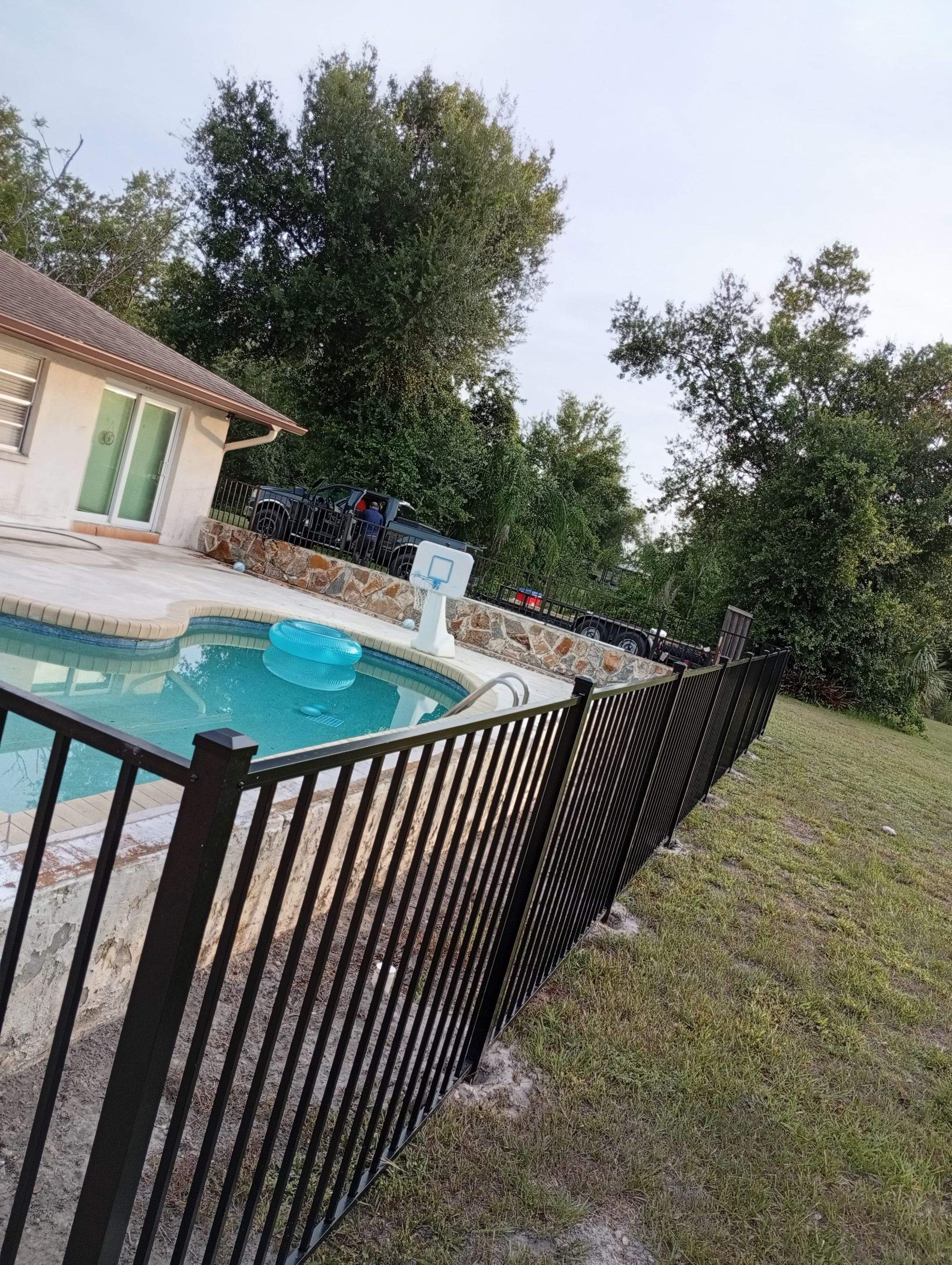 Black Aluminum Pool Safety Fence Installation in Punta Gorda by True Fence LLC