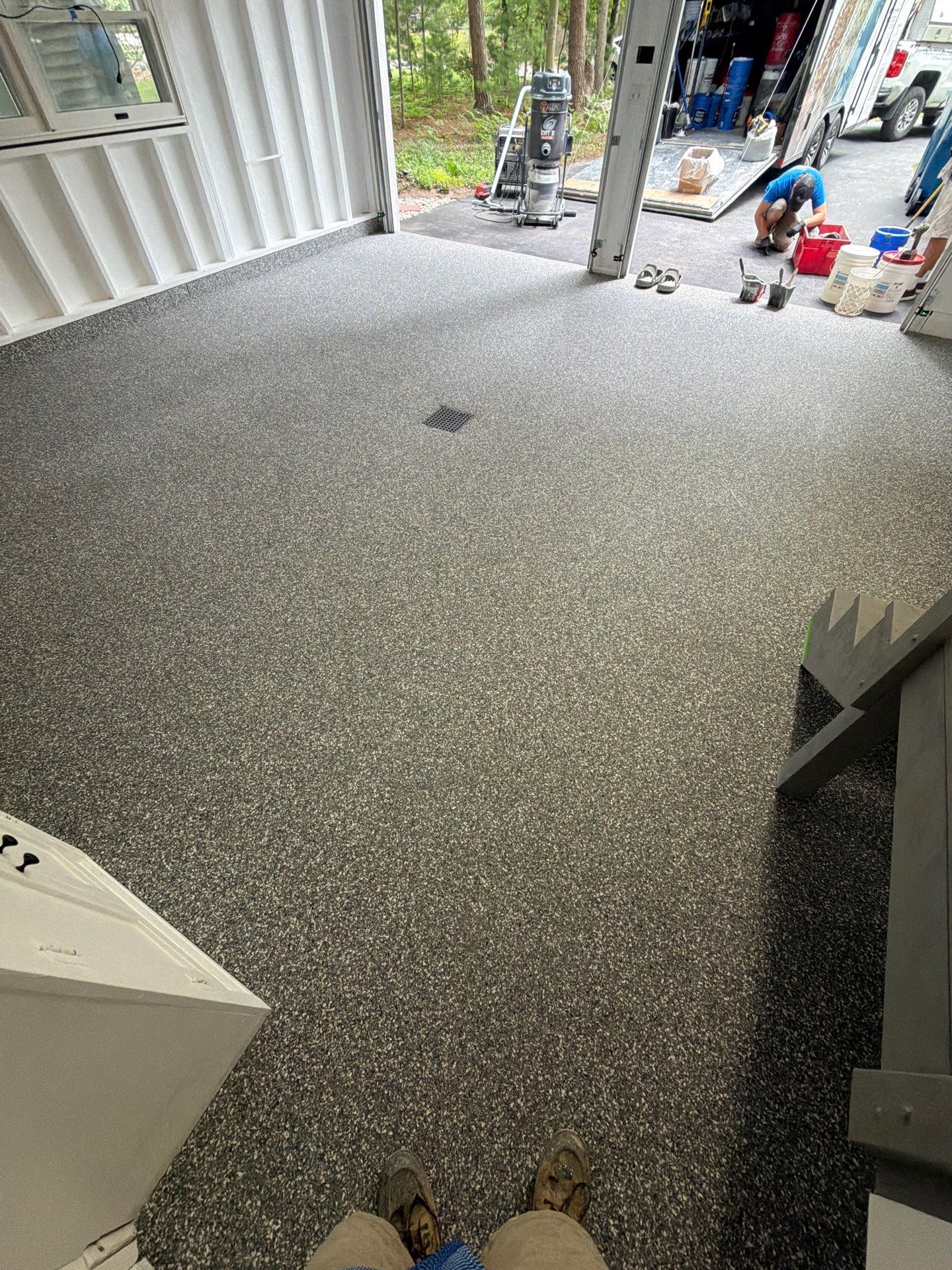 Pentwater Garage Epoxy Flake Floor Installation and Exterior Refinement by Gordon Painting