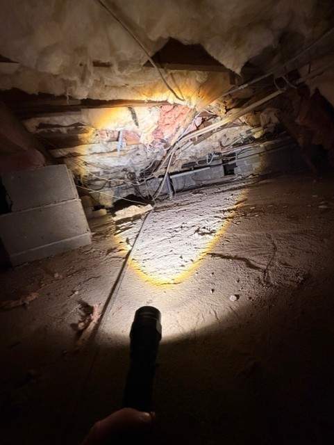 Crawlspace cleaning by Newhouse Restoration