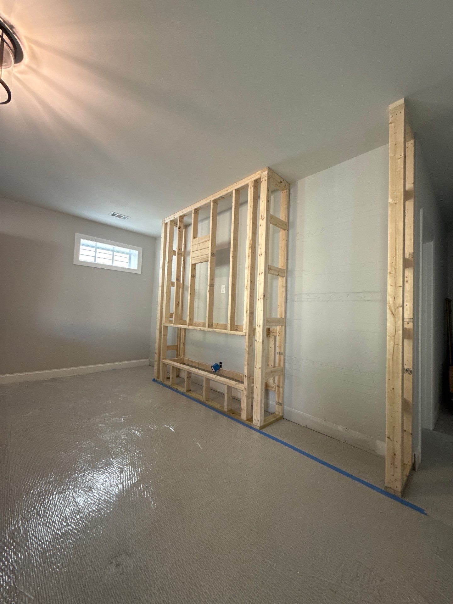 Custom Media Wall and Electric Fireplace Installation in Canton by Swift Home Renovations