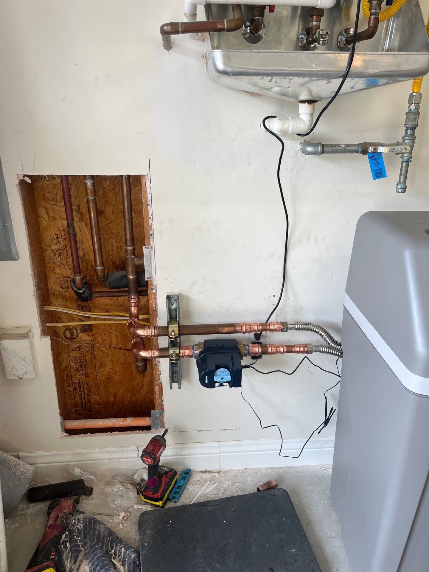 Water Softener, Moen Flo, and Tankless Water Heater Installation by Us Plumbing