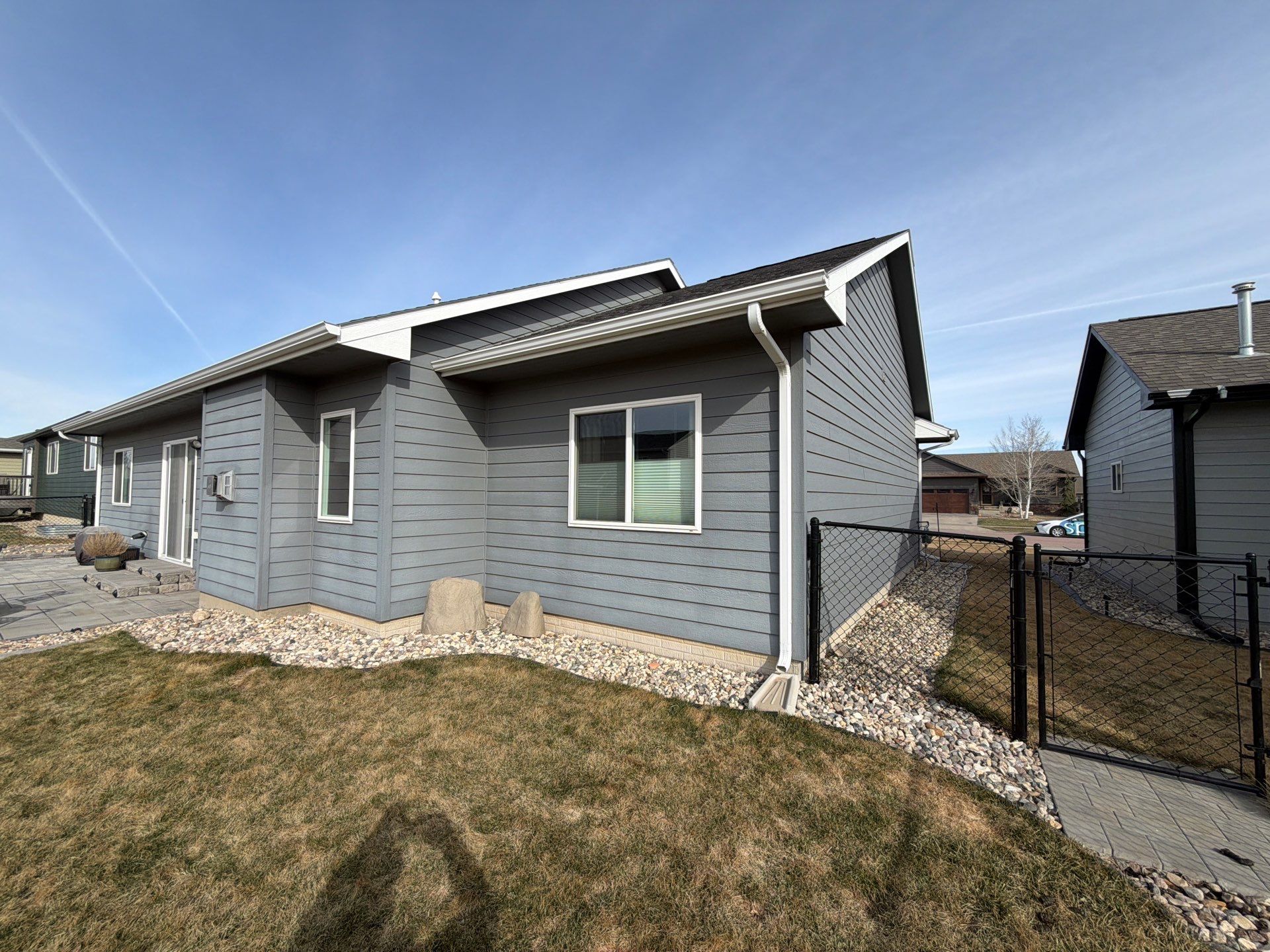 Residential Exterior Painting and Siding Refresh in Sioux Falls by Select Painting, Coatings & Garage Cabinets
