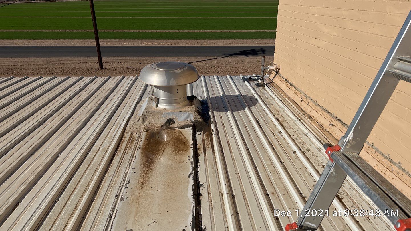 Metal roof restoration on commercial roof using Conklin Benchmark/PUMA XL fabric and coating by Straight Edge Roofing Inc