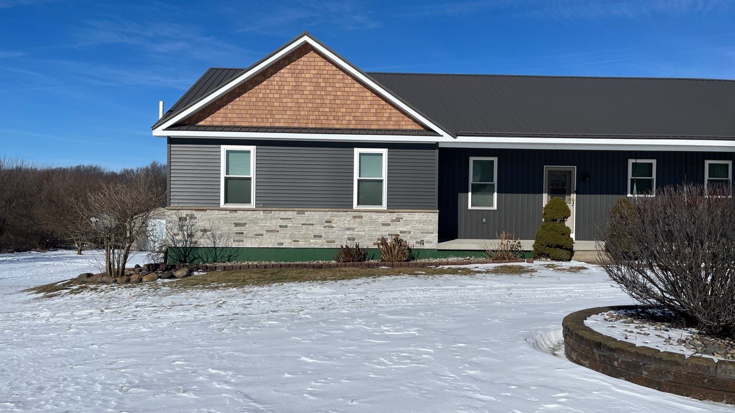 Siding Installation using Certainteed Board & Batten by Acme Exteriors