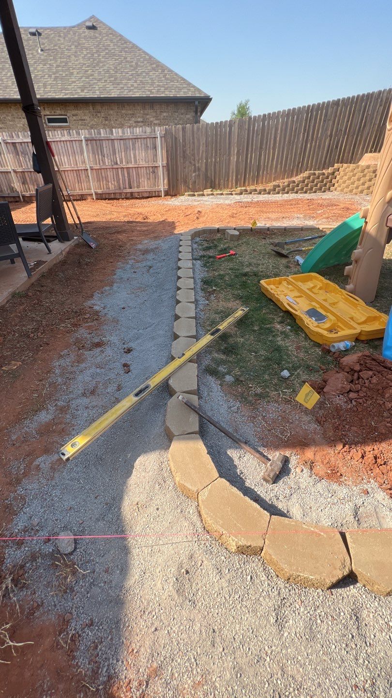 Retaining wall / Playground by Clays Services Inc