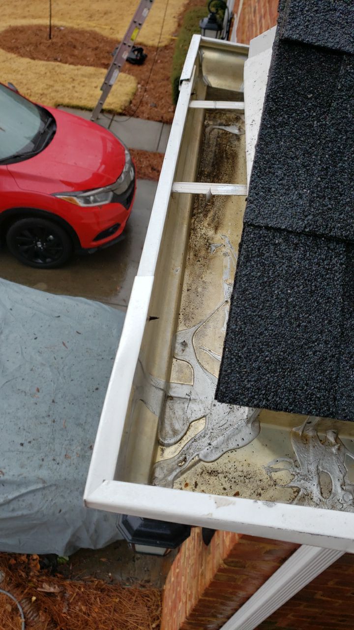 Gutter Cleaning using water by Power Wash Masters LLC