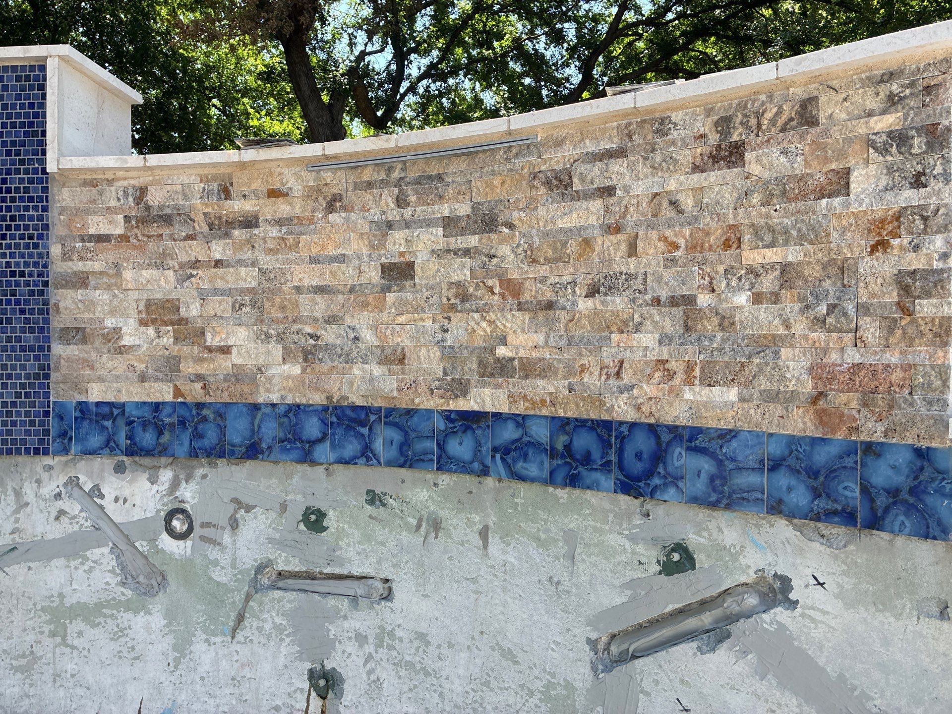 Freeform Pool Remodel with Raised Spa and New Tile by Pinnacle Pools and Spas - DFW