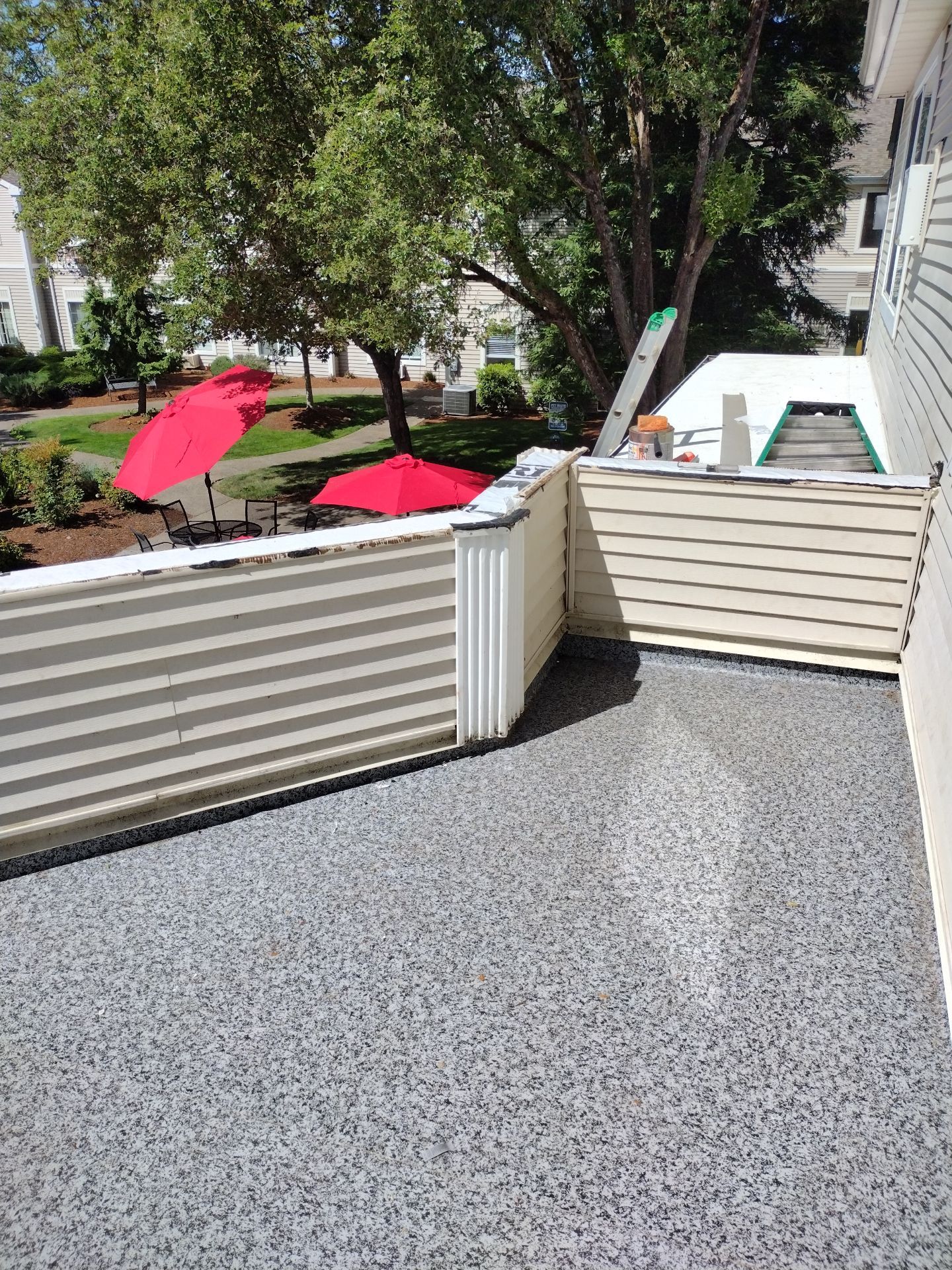 Dec-Tec Walkable Membrane using Dec-Tec (Color: Granite) by Orezona Building & Roofing Company, Inc.