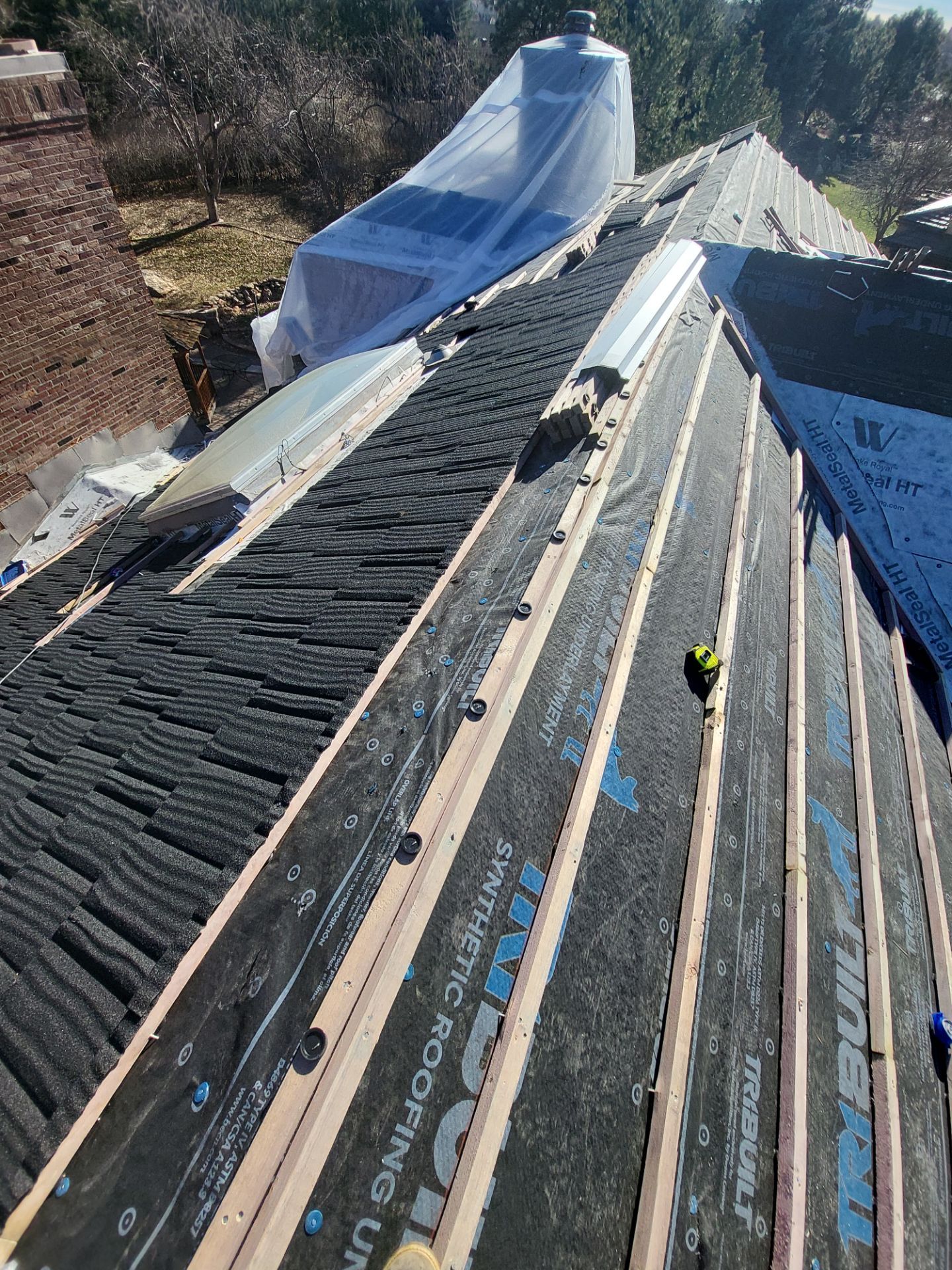 Unified Stone Coated Roof & Stucco Remodle by Blue Peaks Roofing LLC