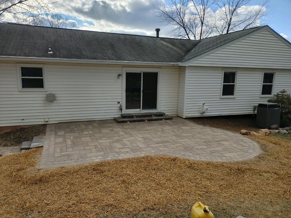 Backyard Transformation using Techo-Bloc Pavers by The Smet Companies, LLC