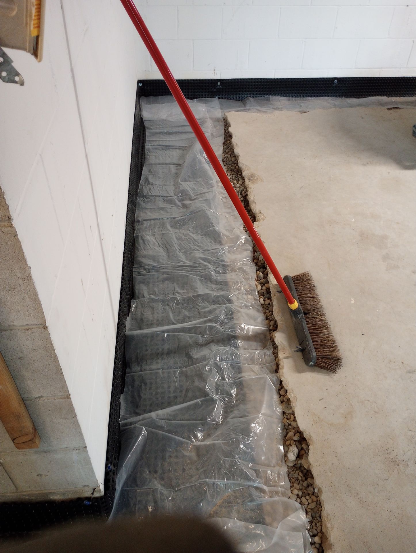 Correcting an Improper Installation for Alan in Chanhassen by Waterproofing Northeast