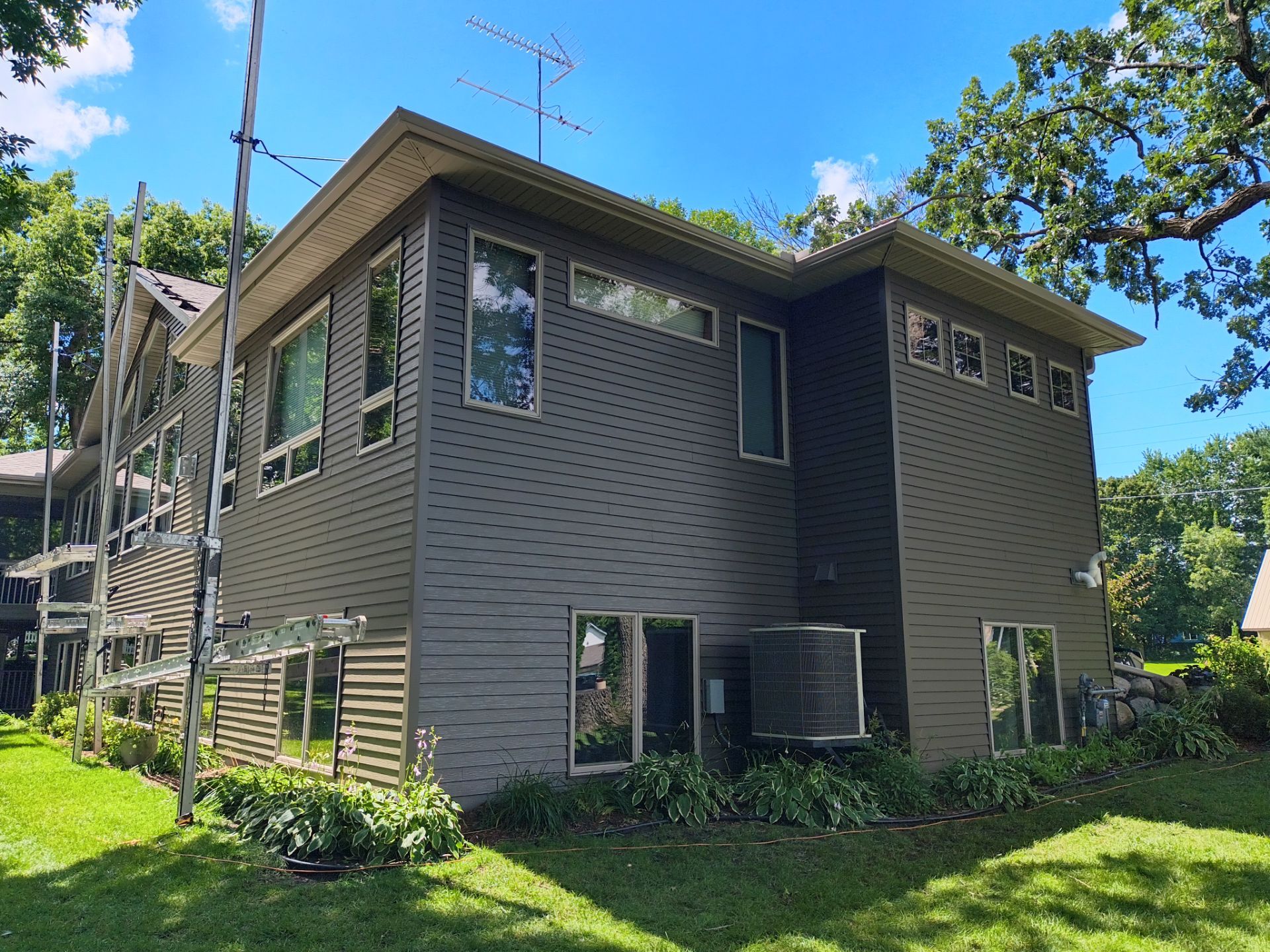5" Seamless Gutter Installation with Leaf Exterminator Gutter Covers – Clear Lake, MN by Next Level Seamless Gutters / Exteriors Inc.