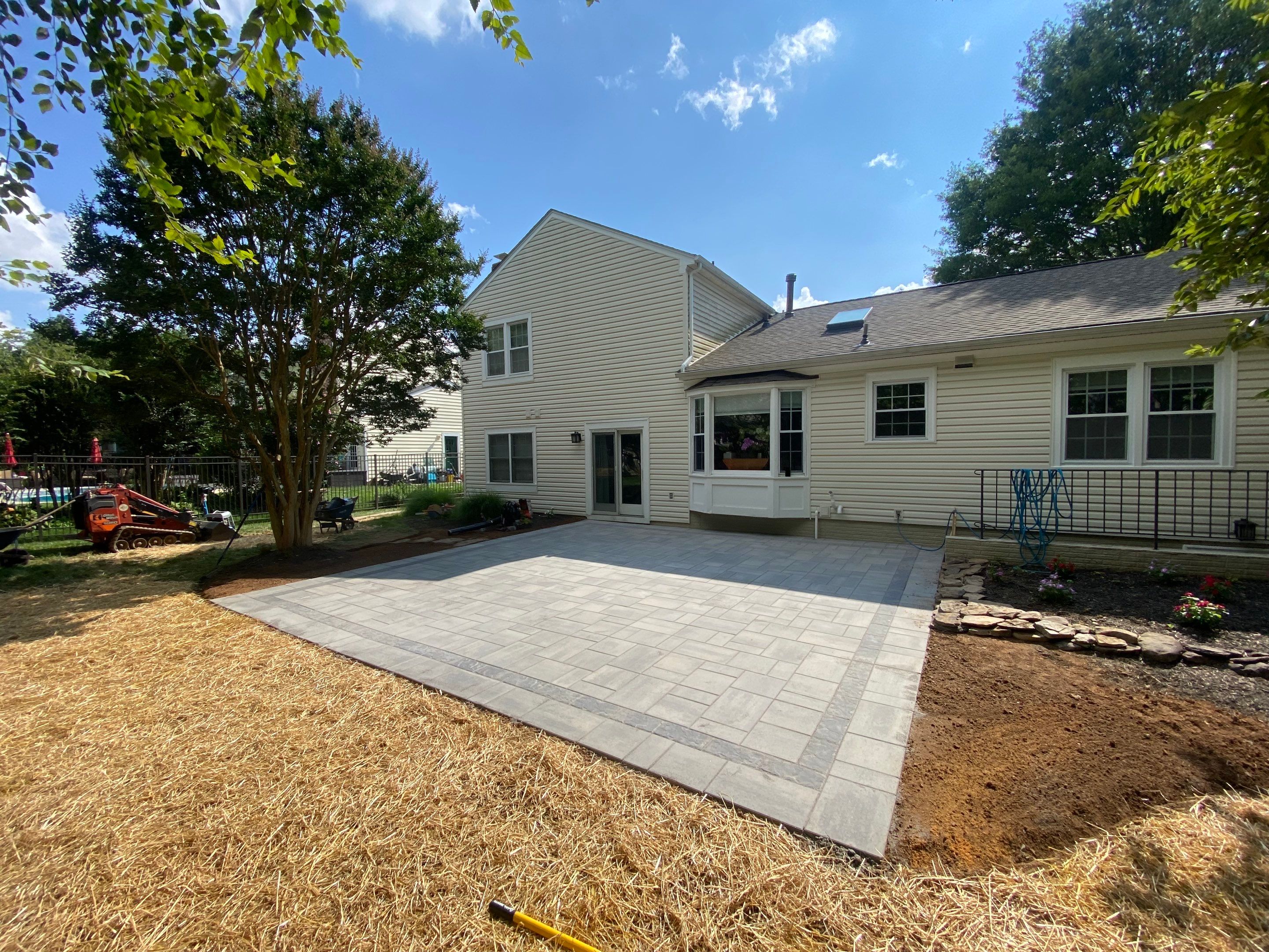 Backyard Transformation using Techo-Bloc Pavers by The Smet Companies, LLC