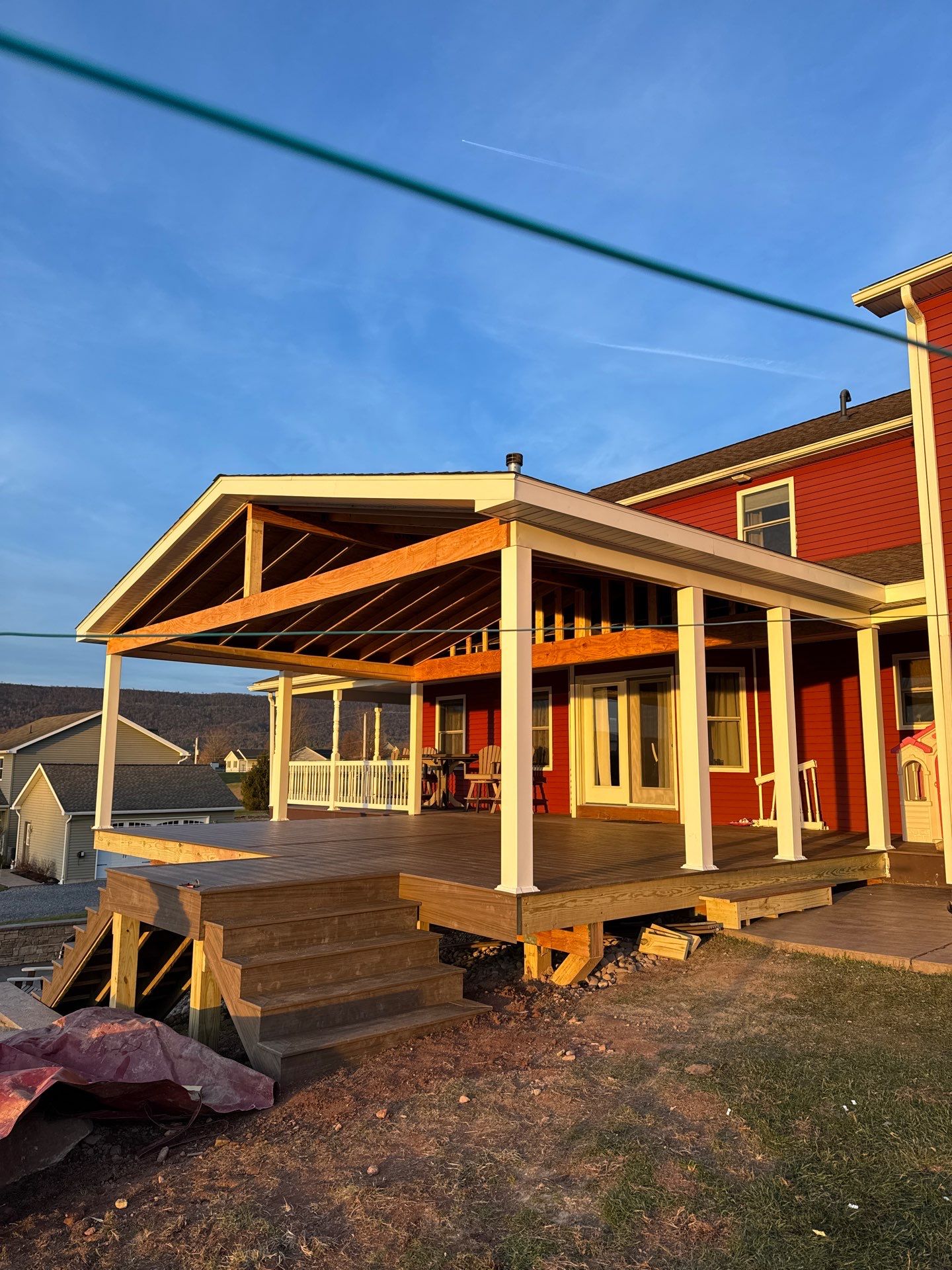 Covered Deck Addition With Custom Gable Roof in Tower City by Esh Builders