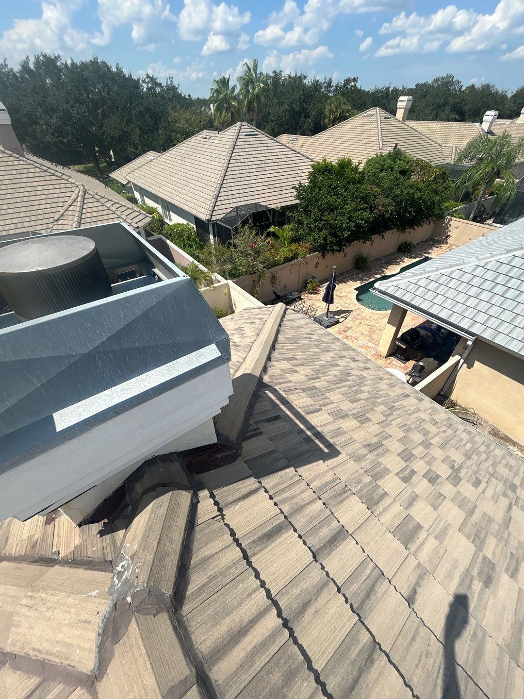 Concrete Tile Roof Repair and Gutter Maintenance in Orlando by Fortified Roofing Solutions Corp.