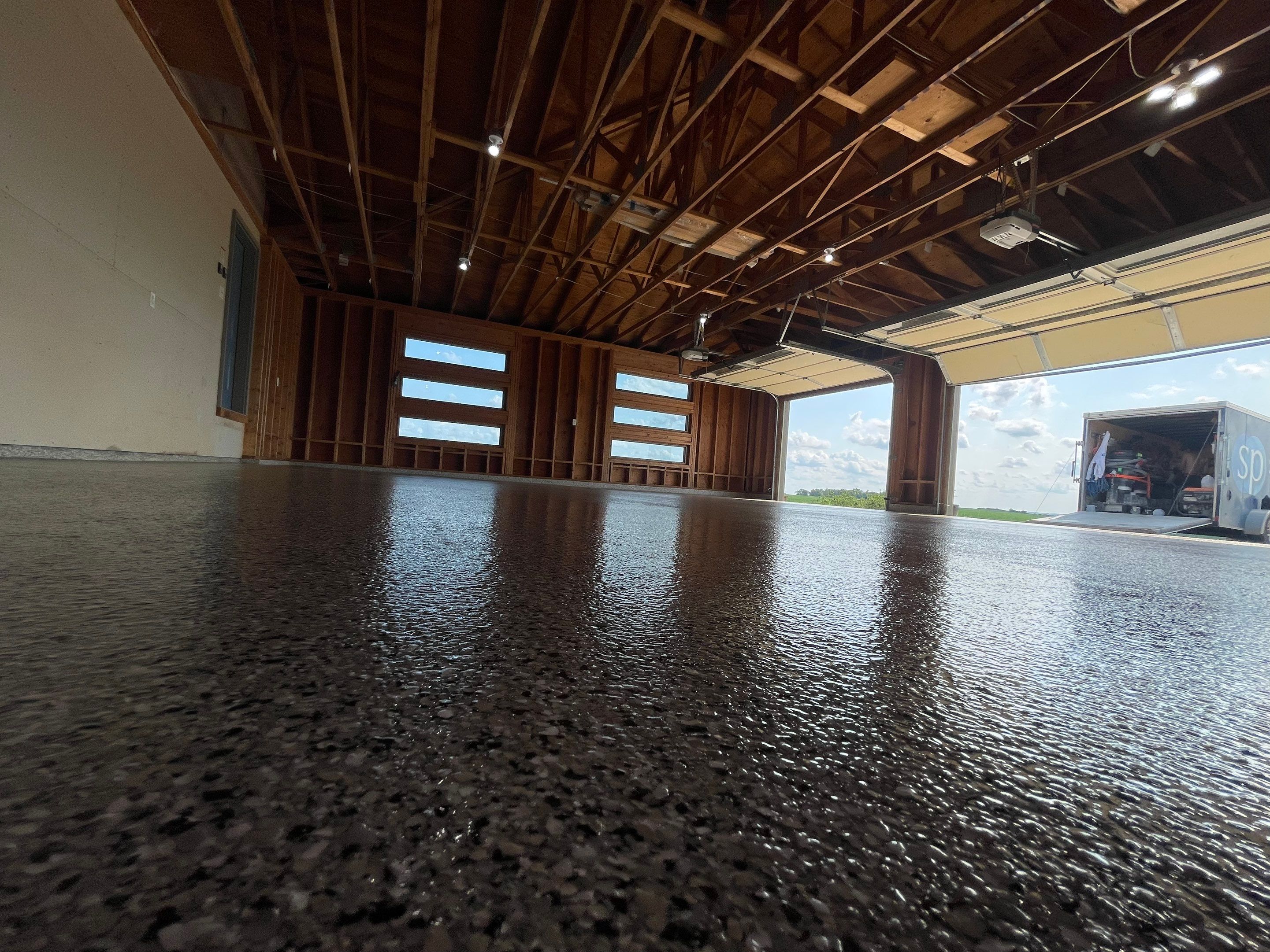 Cabin Fever Coating for Detached Garage in Dell Rapids by Select Painting, Coatings & Garage Cabinets