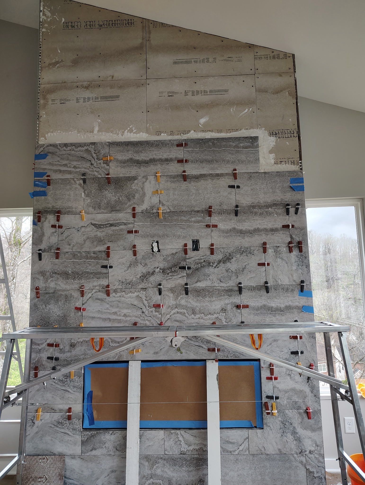 Floor to Ceiling Fireplace Surround by Footprints Floors of Nashville