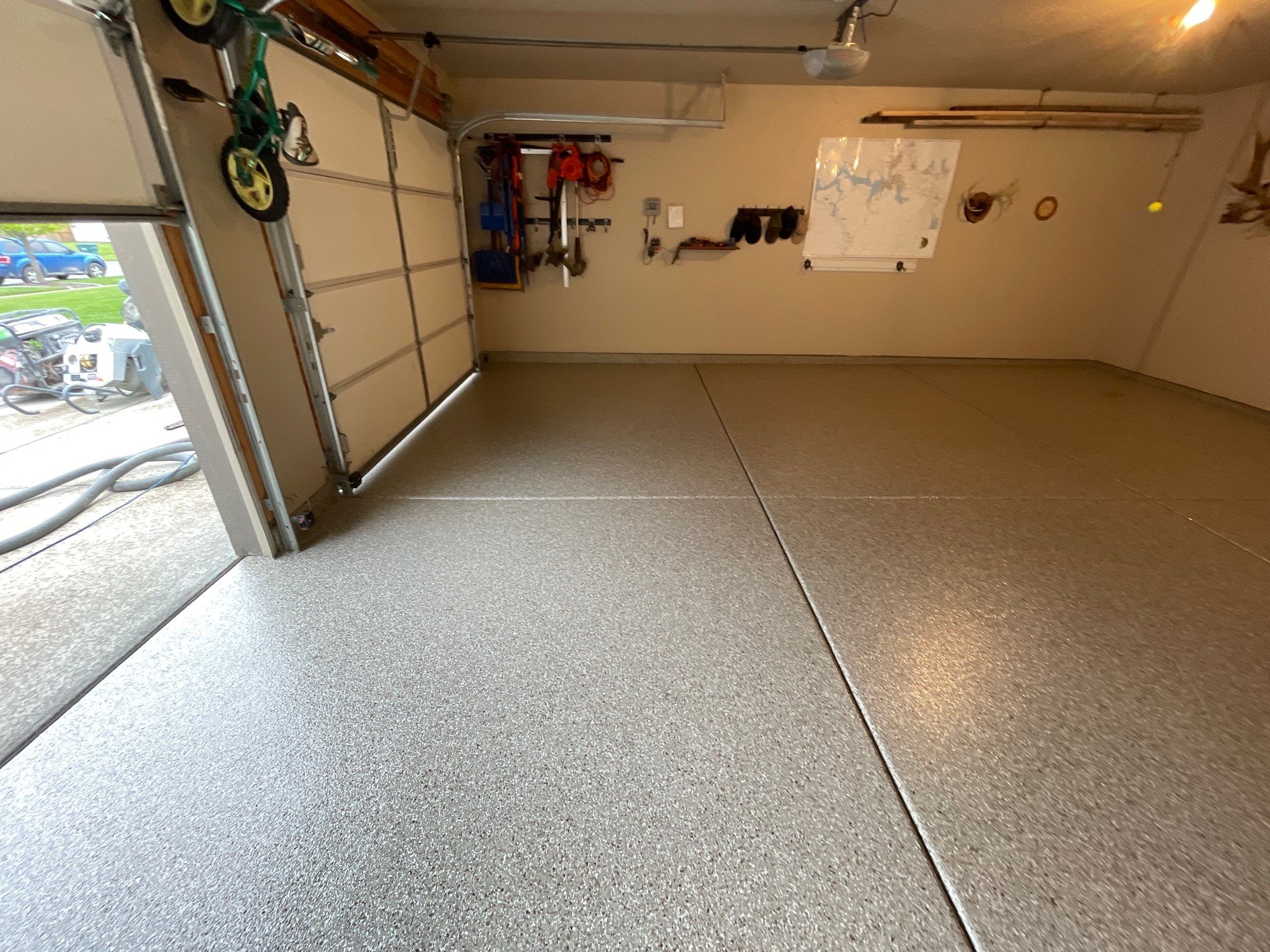 Garage Transformation using Pebble Beach and Front Porch using Greystone by Croc Coatings, LLC
