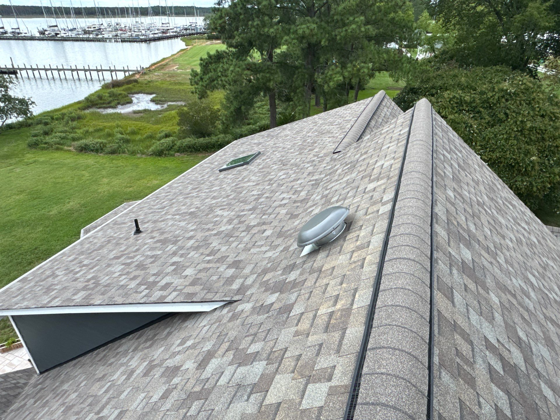Roof Replacement and White Gutter Installation in Gloucester by Cade Construction