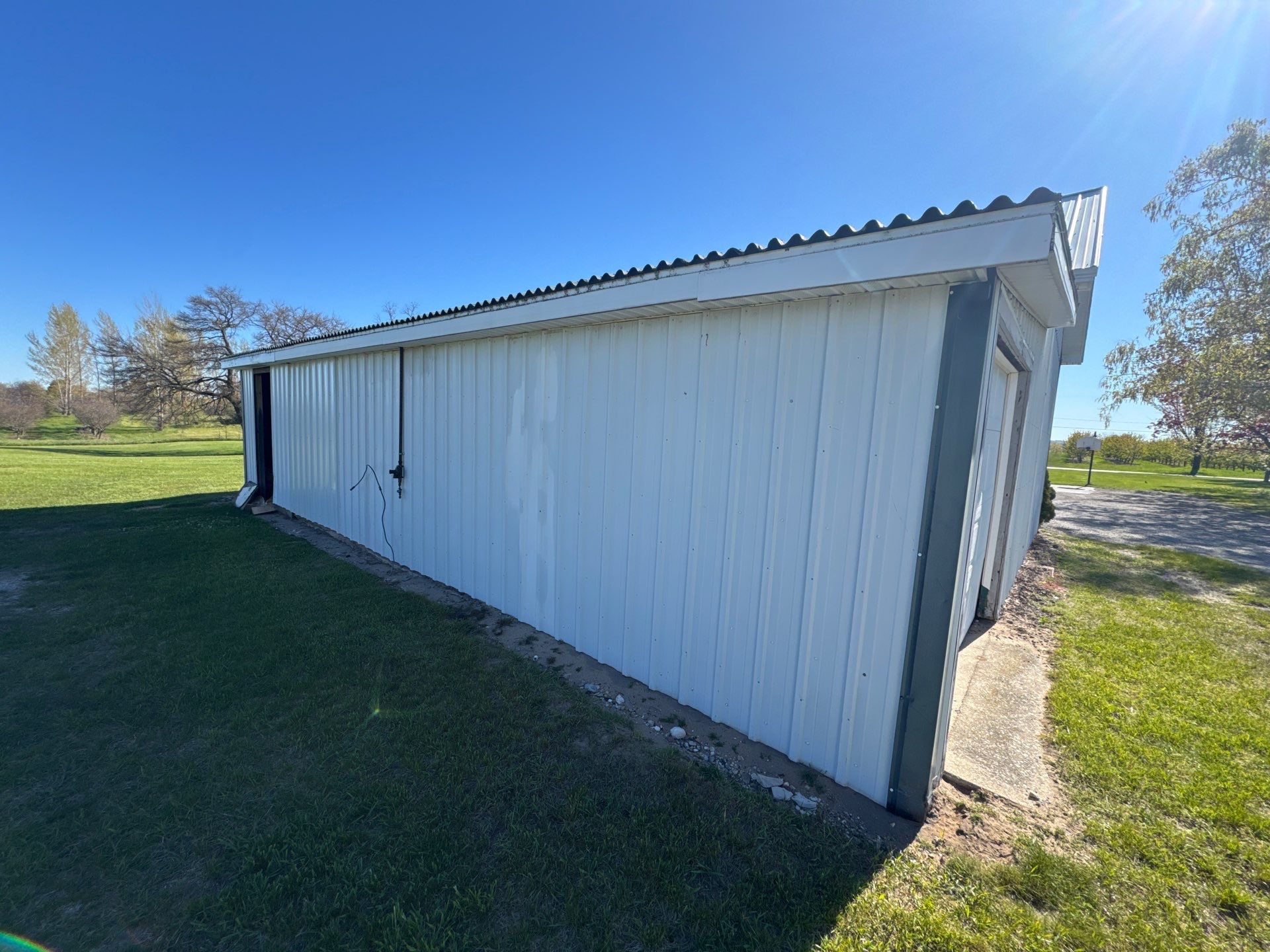 Exterior Painting and Trim Restoration for Mears Metal Buildings by Gordon Painting