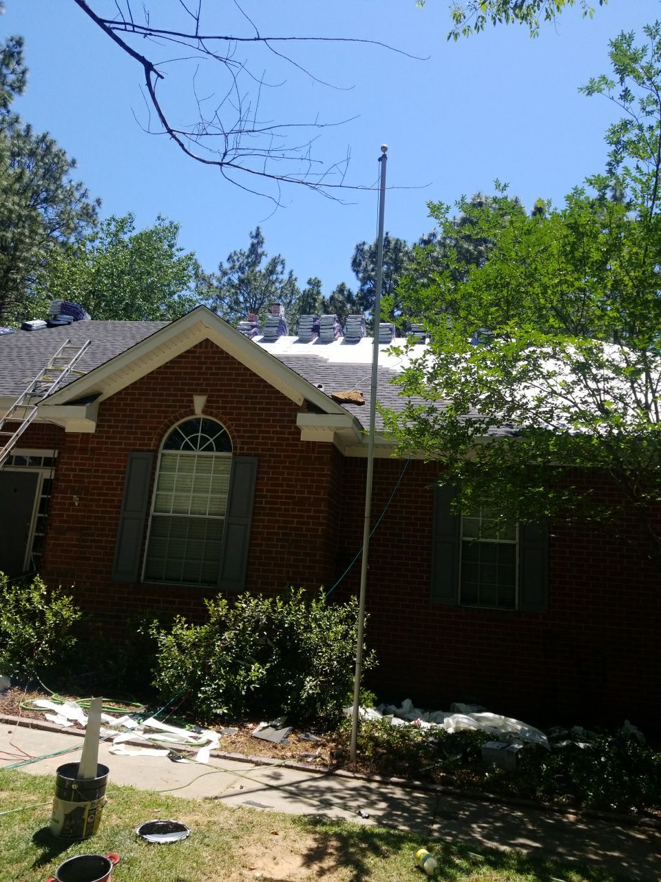 Residential Roofing Installation using Roof Replacement by American Roofing & Construction LLC