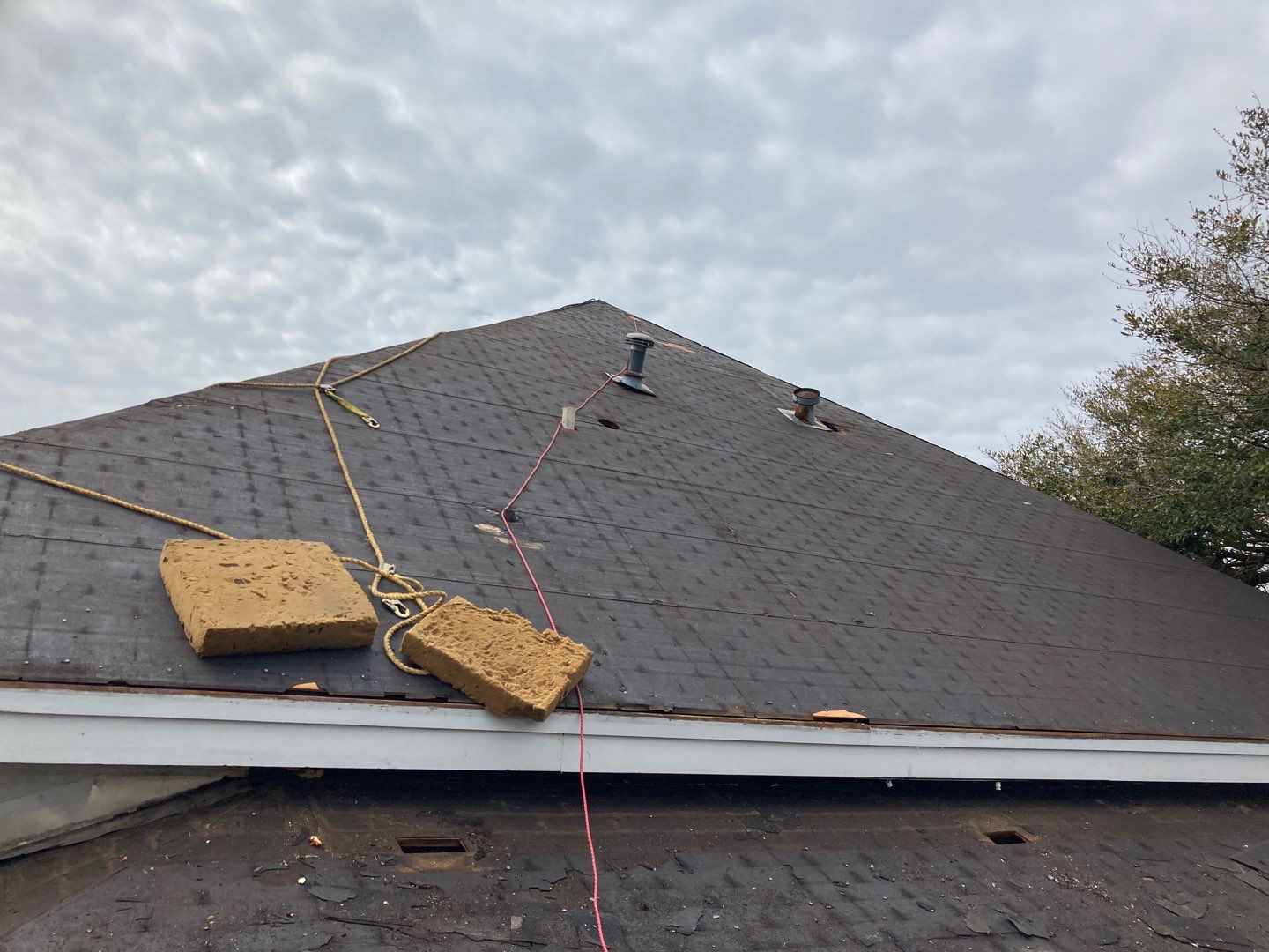 Residential Roofing Installation using Roof Replacement by American Roofing & Construction LLC