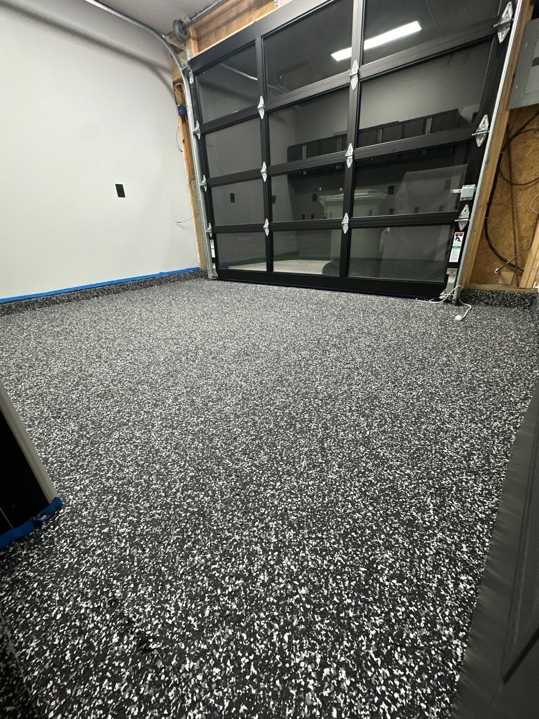 Custom Flake Epoxy Garage Floor in Lincoln by Goat Coatings