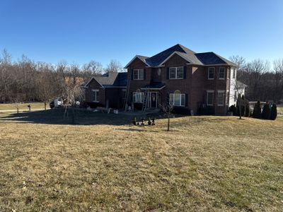 Residential Roofing Installation using Malarkey Vista AR Shingles (Black Oak)