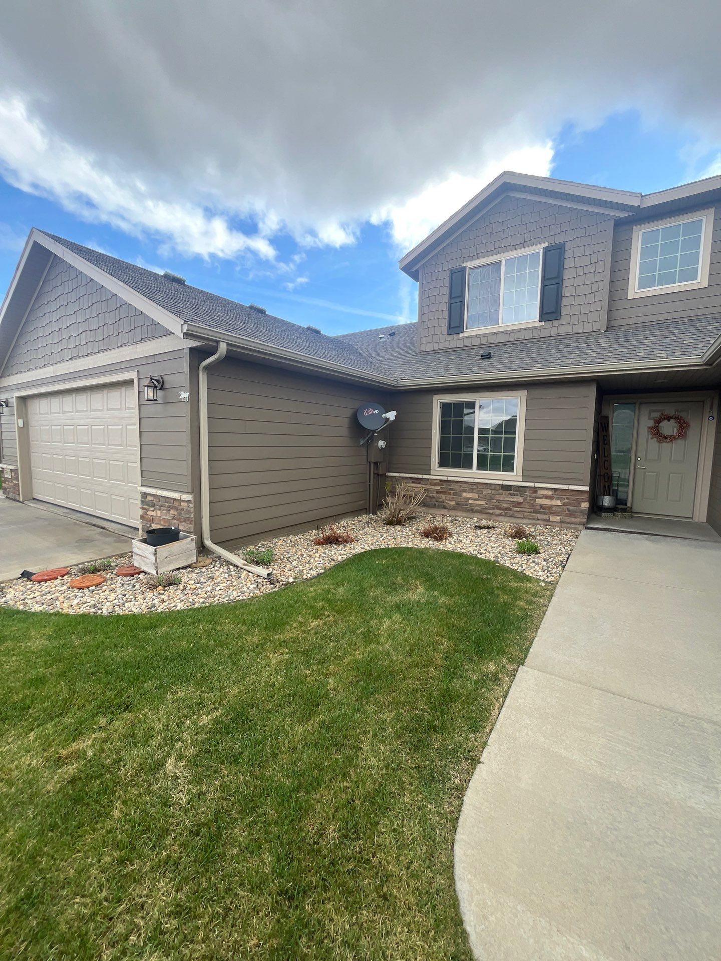 Exterior Painting for Multi-Unit Townhomes in Sioux Falls by Select Painting, Coatings & Garage Cabinets