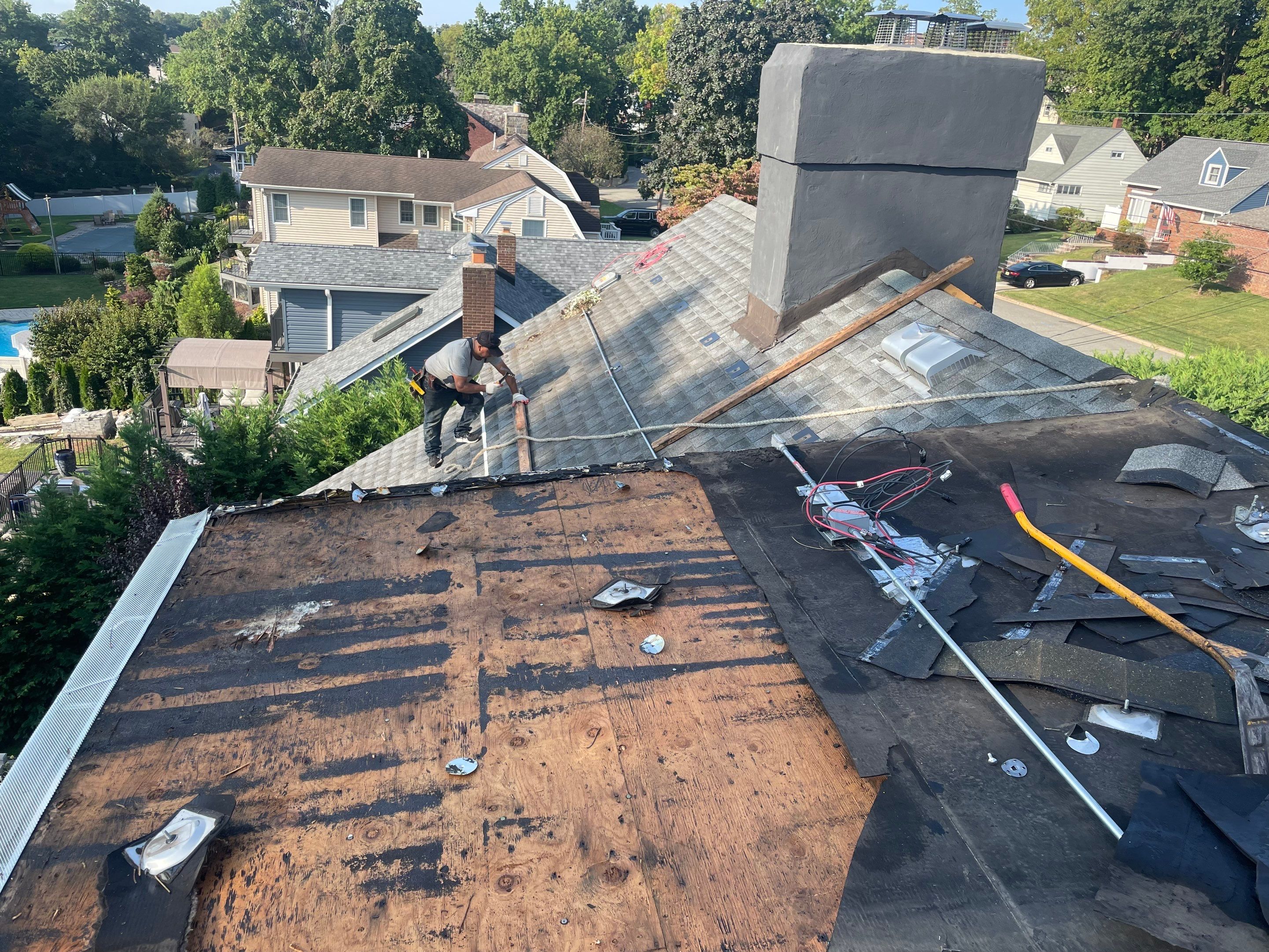 Estate Gray Shingles by Reimagine Roofing